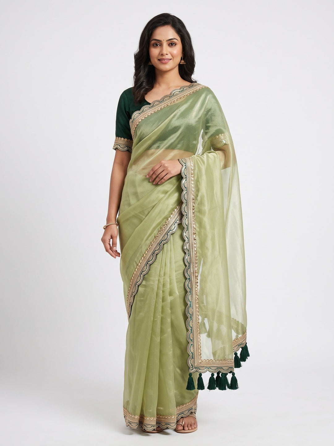 Pista Green Net Saree With Intricate Sequin Embroidery & Tassel Embellished Pallu - Image 1