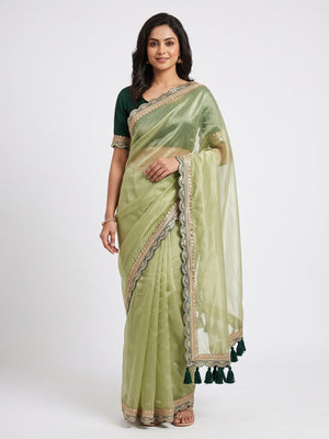 Pista Green Net Saree With Intricate Sequin Embroidery & Tassel Embellished Pallu - Image 1