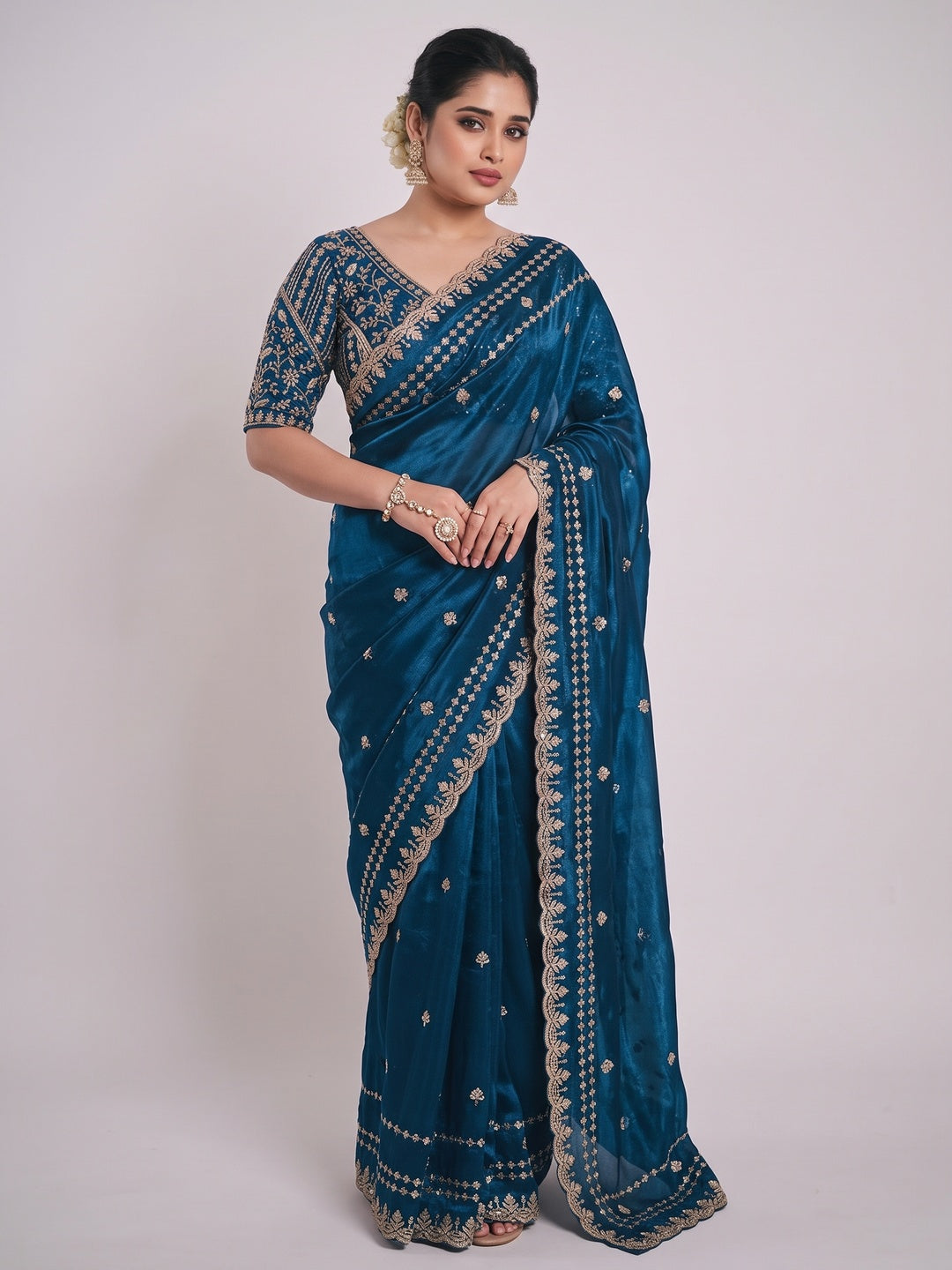 Luxurious Blue Floral Zari Embroidered Satin Saree Accented With Fine Sequins Work - Image 1