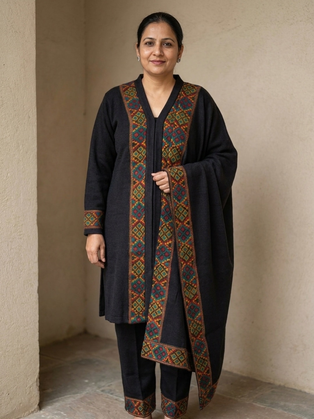 Peachmode Black Woolen Salwar Suit With Woven Border - Image 1