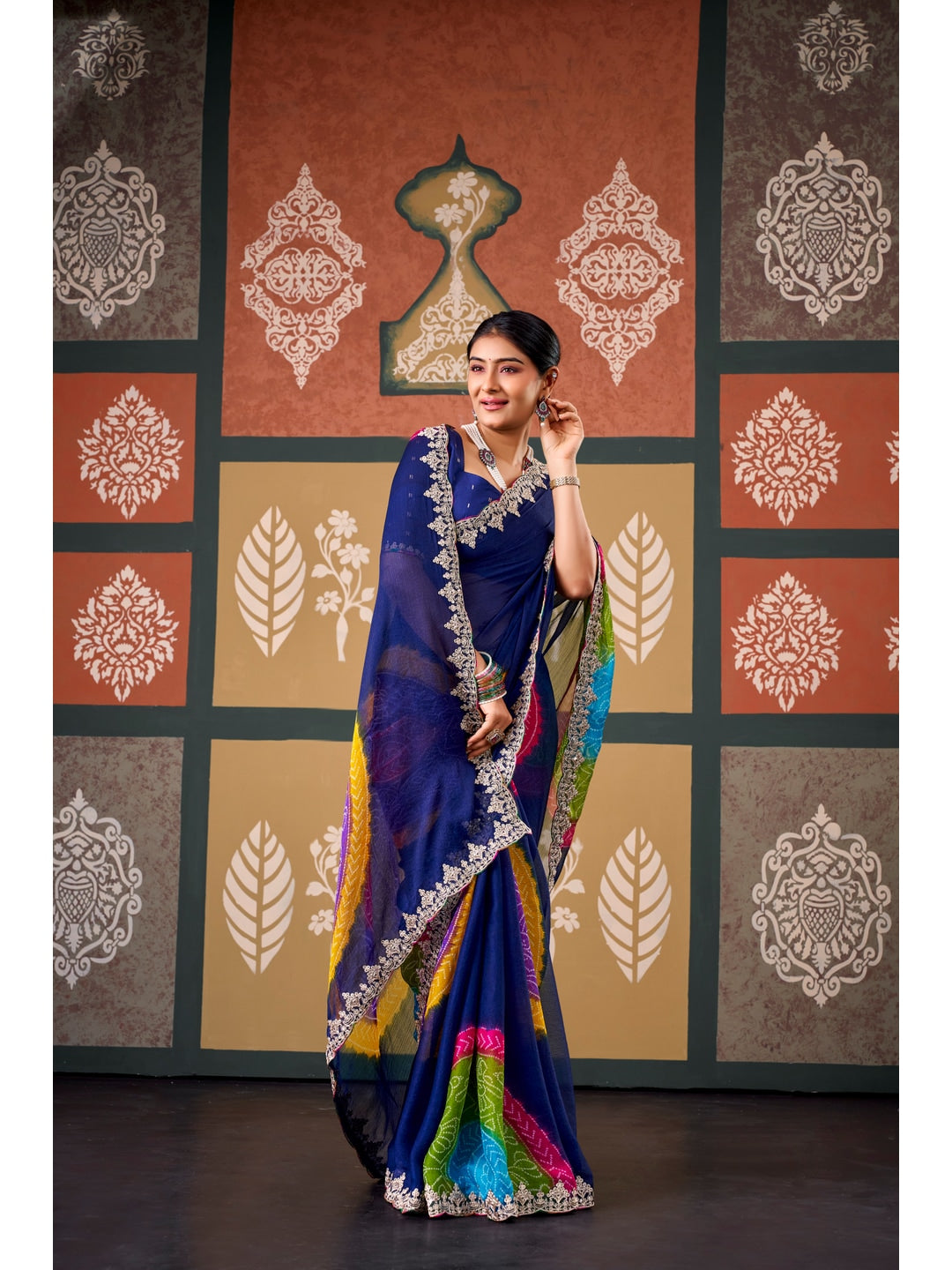 Peachmode Navy Blue Bandhani Printed Chiffon Saree With Embroidered Border - Image 1