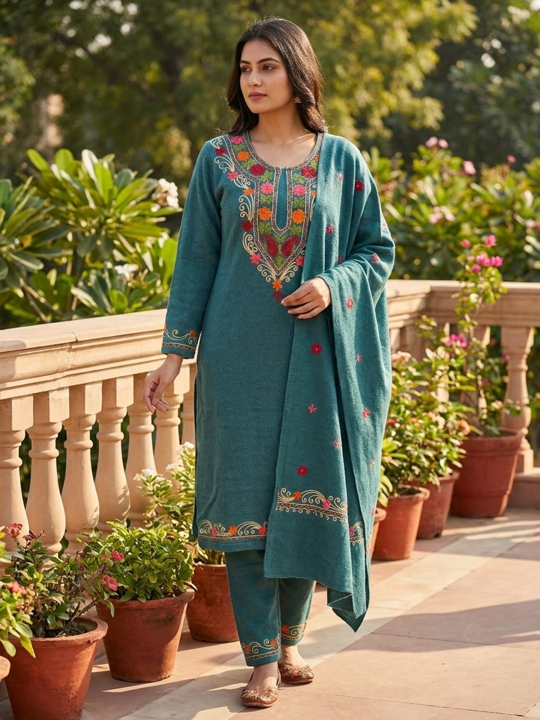 Peachmode Teal Woolen Salwar Suit With Floral Embroidery - Image 1
