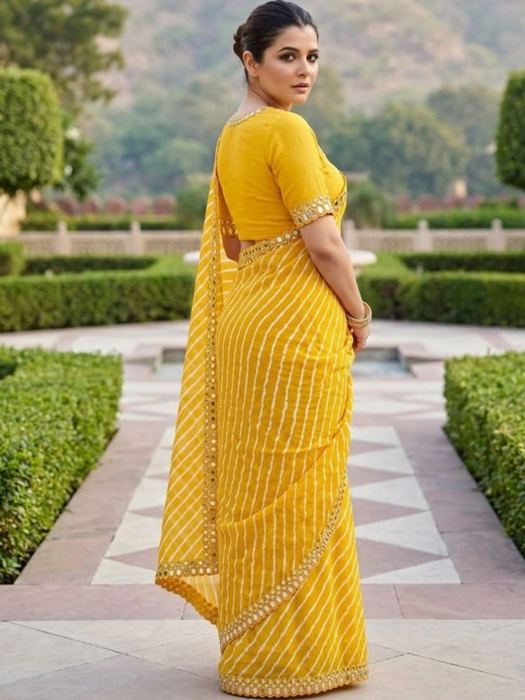 Peachmode Yellow Lehariya Printed Georgette Saree With Mirror Border - Image 3