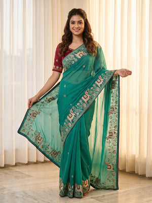 Peachmode Teal Embroidered Sequins Star Georgette Saree With Pichwai Cow Pallu - Image 1