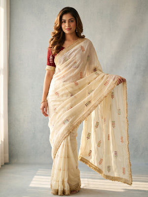 Peachmode Cream Satin Saree With Rainbow Leaf Sequin Work And Lace Border - Image 1