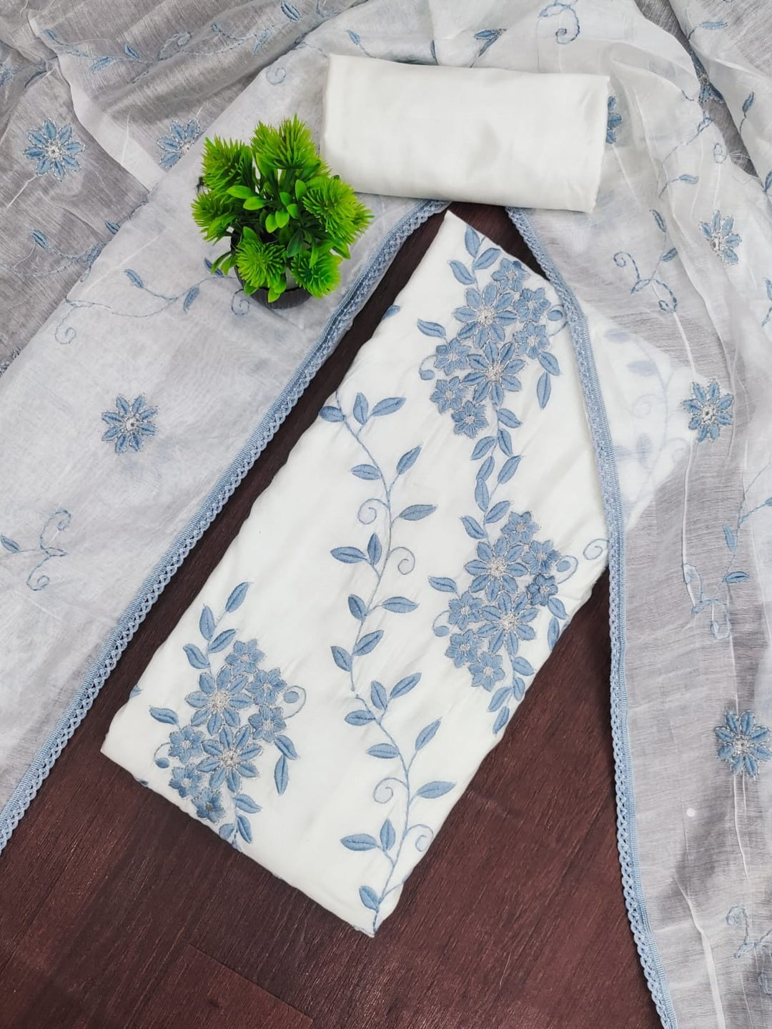 Peachmode Blue Roman Silk Unstitched Dress Material With Contrast Floral Vine Embroidery - Image 1