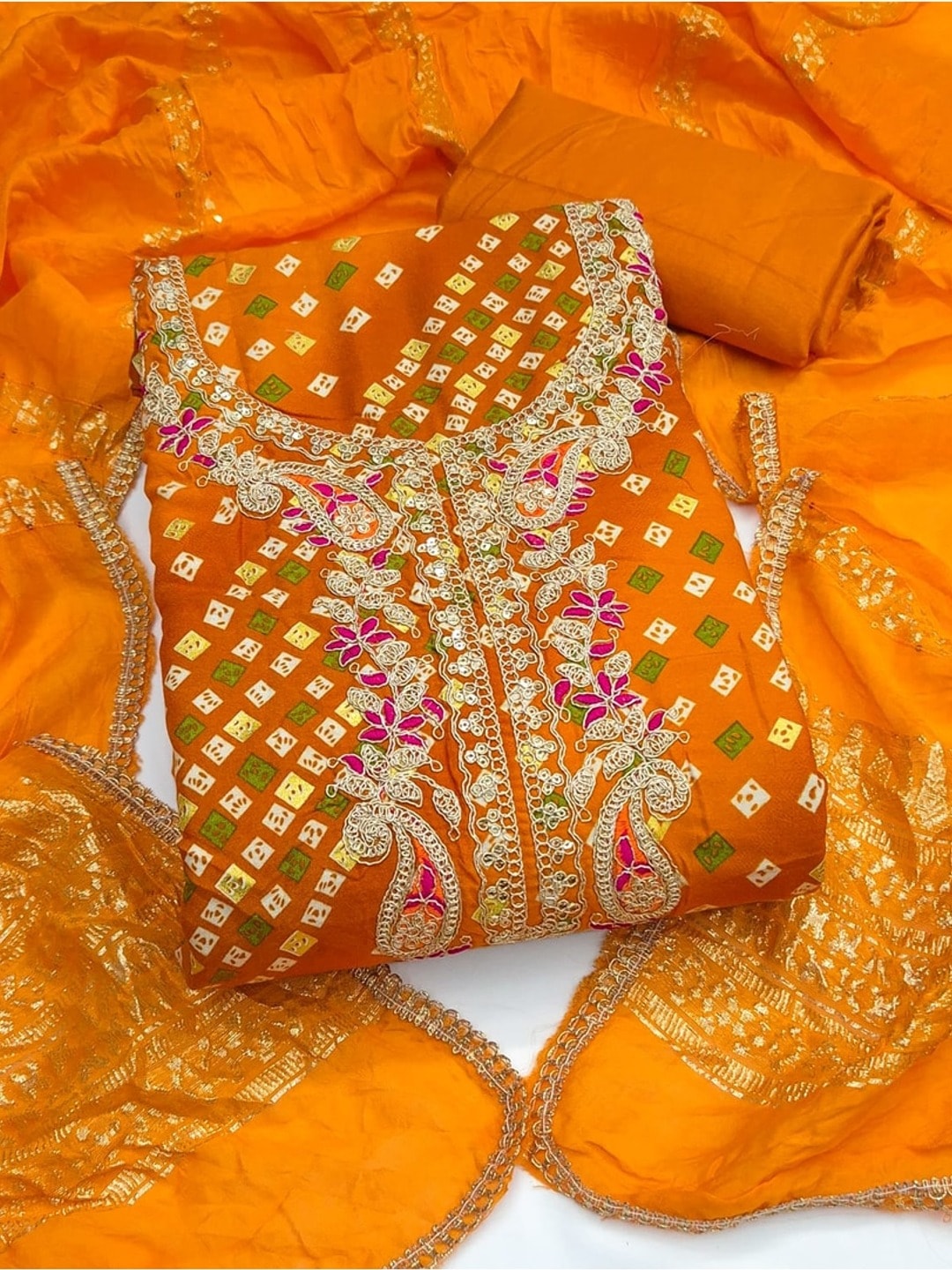 Peachmode Orange Rayon Bandhani Print Unstitched Dress Material With Zari Neck Embroidery - Image 4