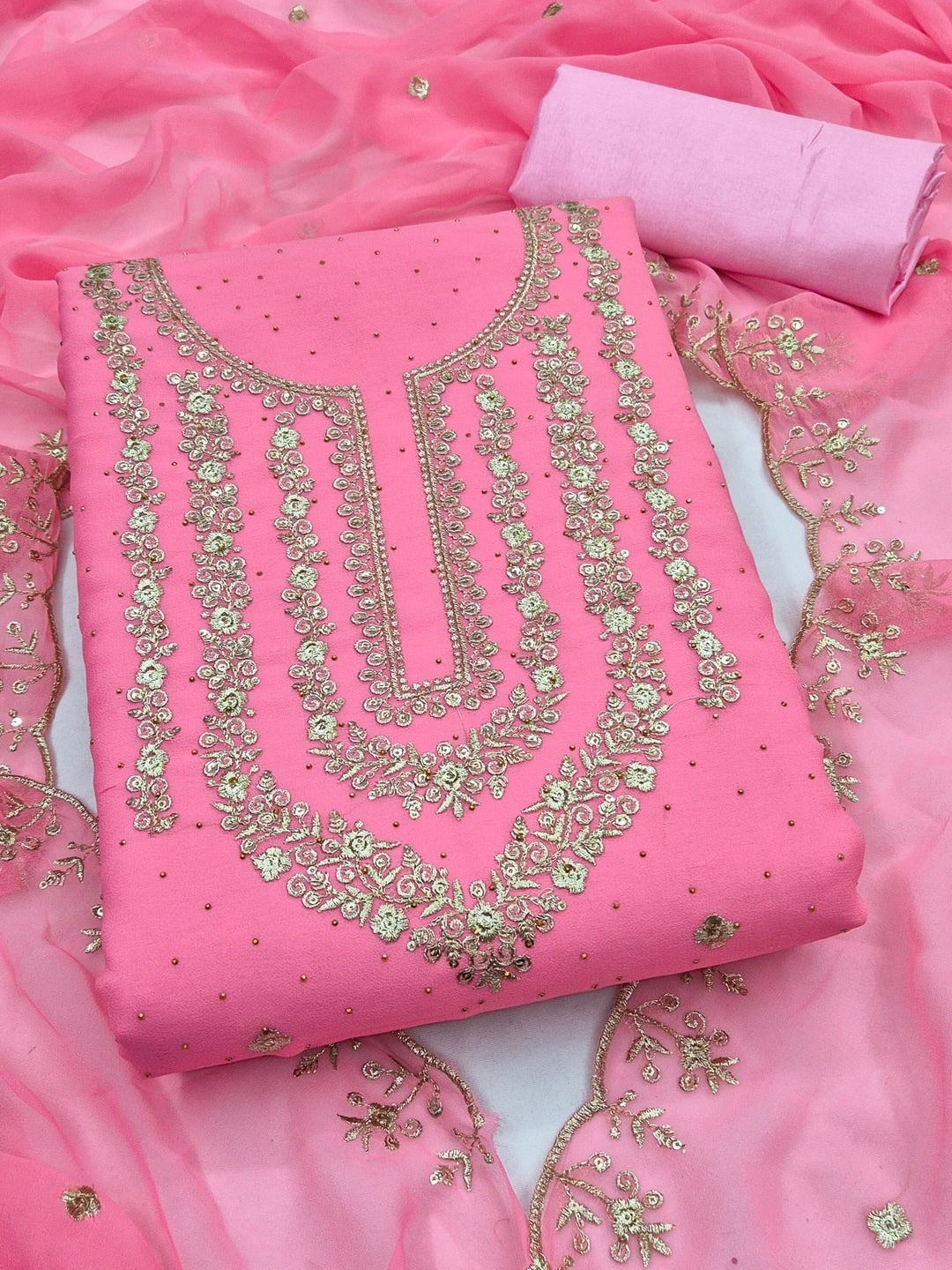Peachmode Pink Zari Work Georgette Dress Material - Image 1