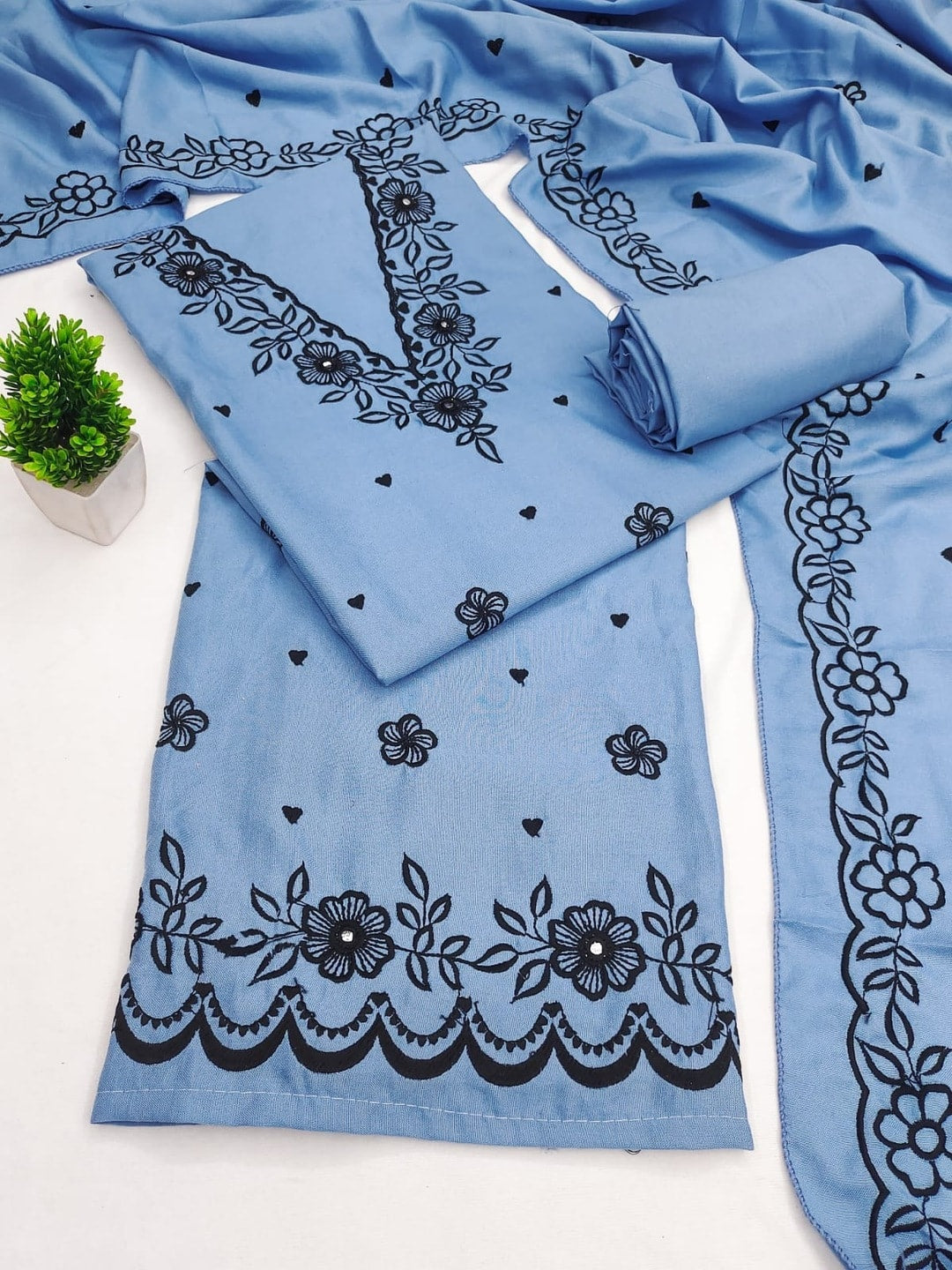 Peachmode Sky Blue Poly Rayon Unstitched Dress Material With Black Floral Embroidered Neck And Daman Work And Embroidered Dupatta - Image 1