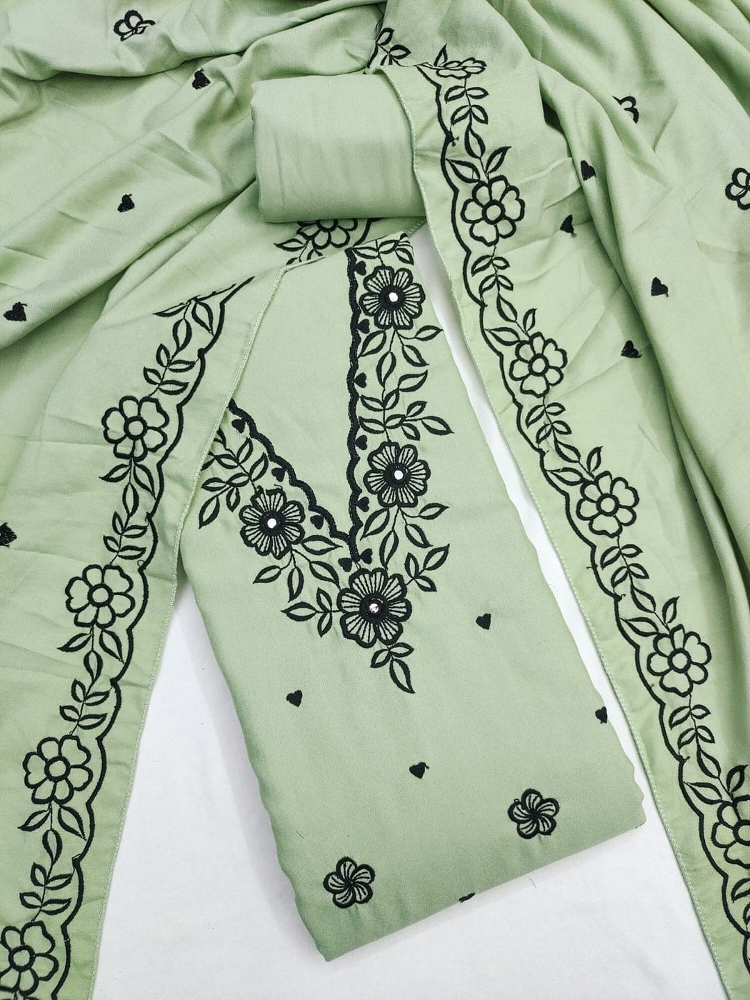 Peachmode Light Green Poly Rayon Unstitched Dress Material With Black Floral Embroidered Neck And Daman Work And Embroidered Dupatta - Image 1