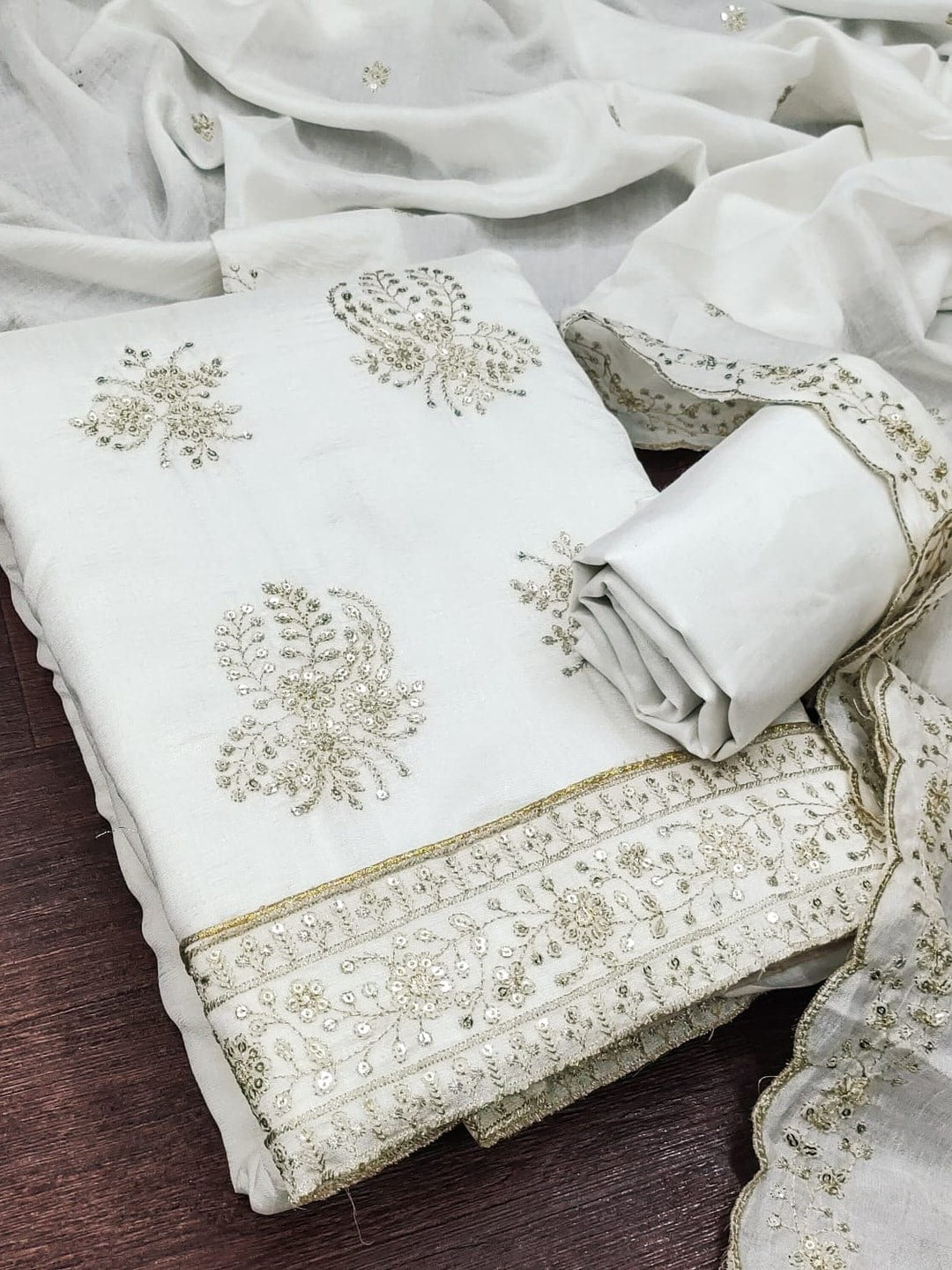 Peachmode White Vichitra Silk Unstitched Dress Material With Gold Butterfly Floral Sequence Work And Scalloped Embroidered Dupatta - Image 1