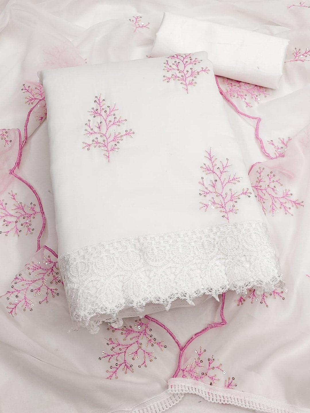 Peachmode White Georgette Unstitched Dress Material With Pink Thread Sequence Work And Lace Hem Scalloped Dupatta - Image 1