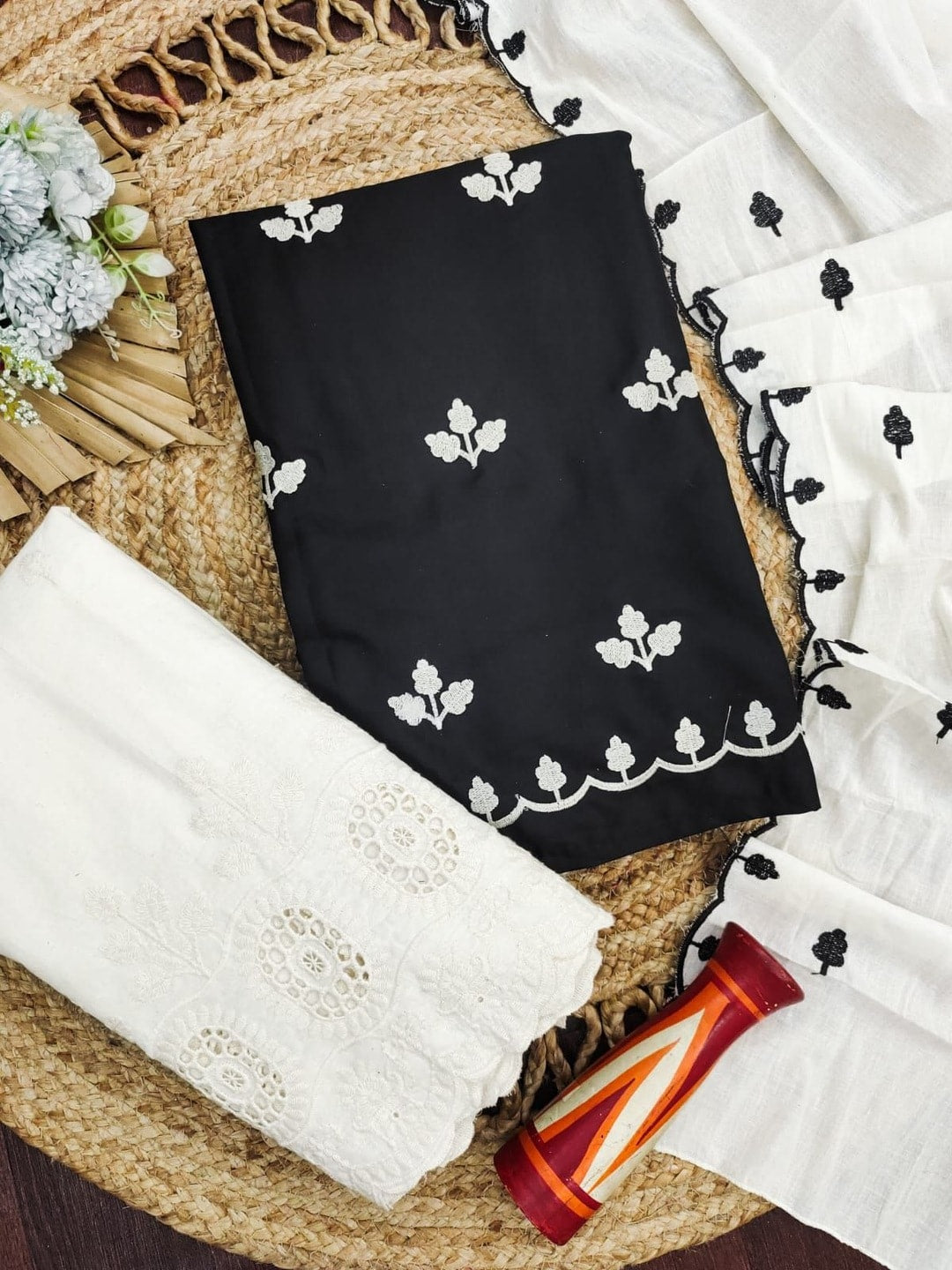 Peachmode Black Poly Rayon Unstitched Dress Material With Leaf Buti Embroidery And Schiffli Cambric Cotton Bottom And Dupatta - Image 1