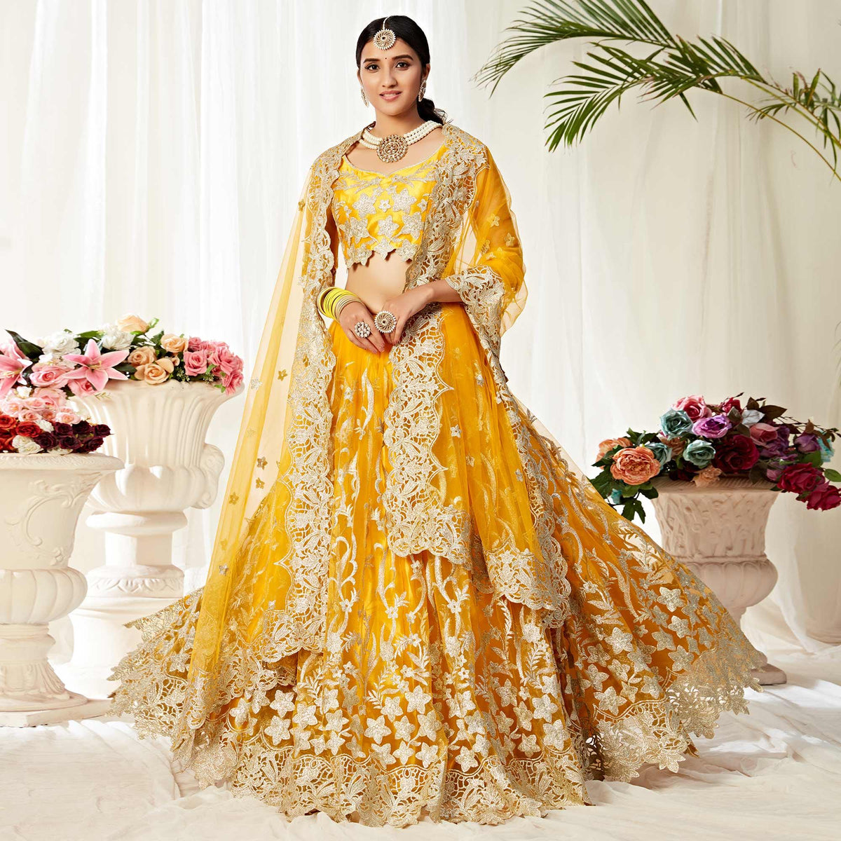 Impressive Yellow Colored Wedding Wear Embroidered Heavy Net Lehenga Choli - Image 2