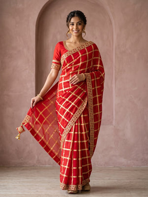 Peachmode Red Viscose Zari Check Saree With Swastik Lace Border - Image 1