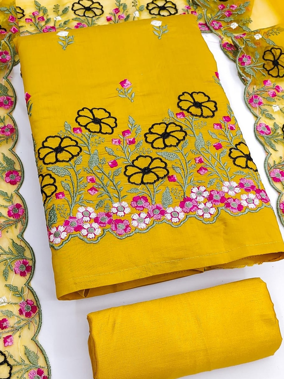 Peachmode Mustard Roman Silk Unstitched Dress Material With Multi Floral Embroidery And Organza Dupatta - Image 1