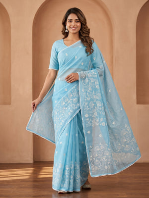 Peachmode Sky Blue Kota Doria Check Saree With Thread Embroidery And Pom Pom Lace Border - Image 1