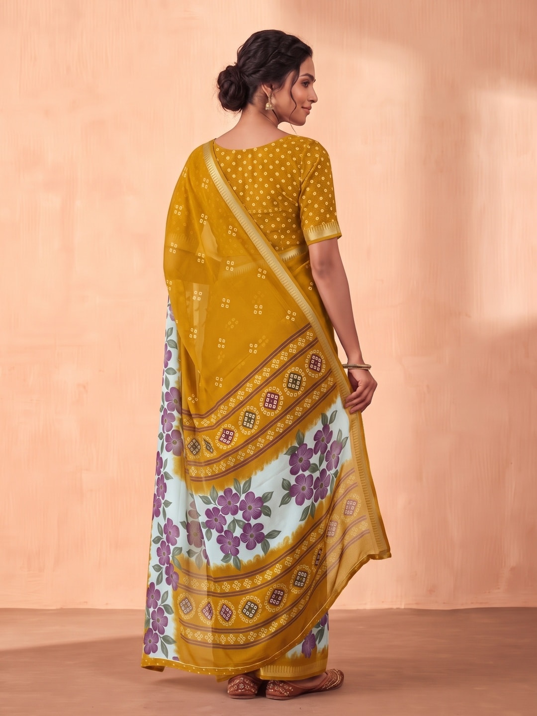 Peachmode Mustard Moss Georgette Saree With Burj Khalifa Zari Border And Floral Bandhani Print - Image 2