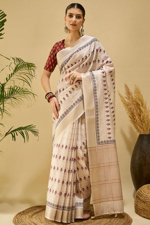 Soft Cream Katki Cotton-Silk Saree With Subtle Floral Motifs & Tassel Edge Pallu