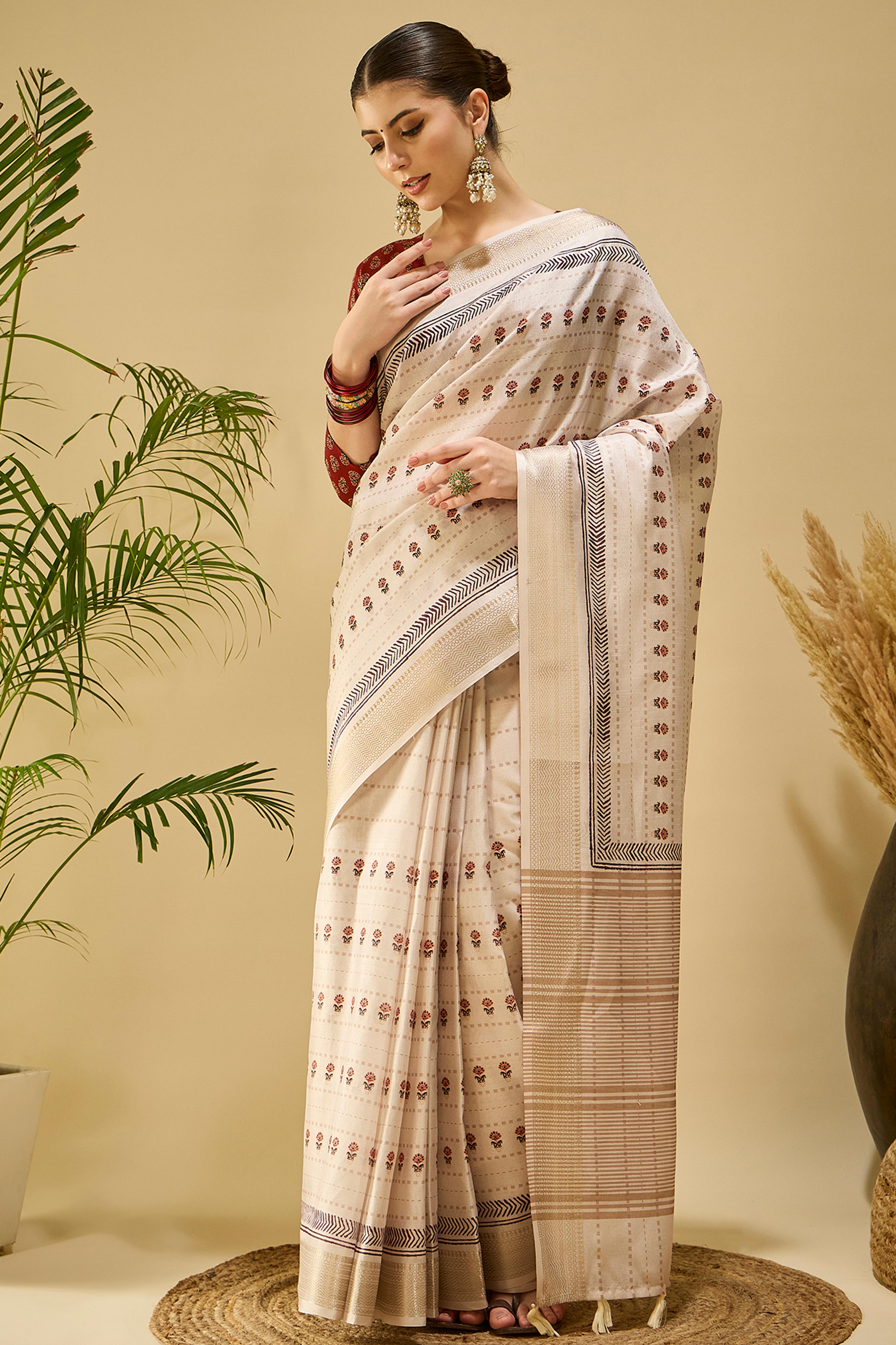 Timeless Cream Katki Cotton Silk Saree With Blooming Floral Prints & Tassel Draped Pallu