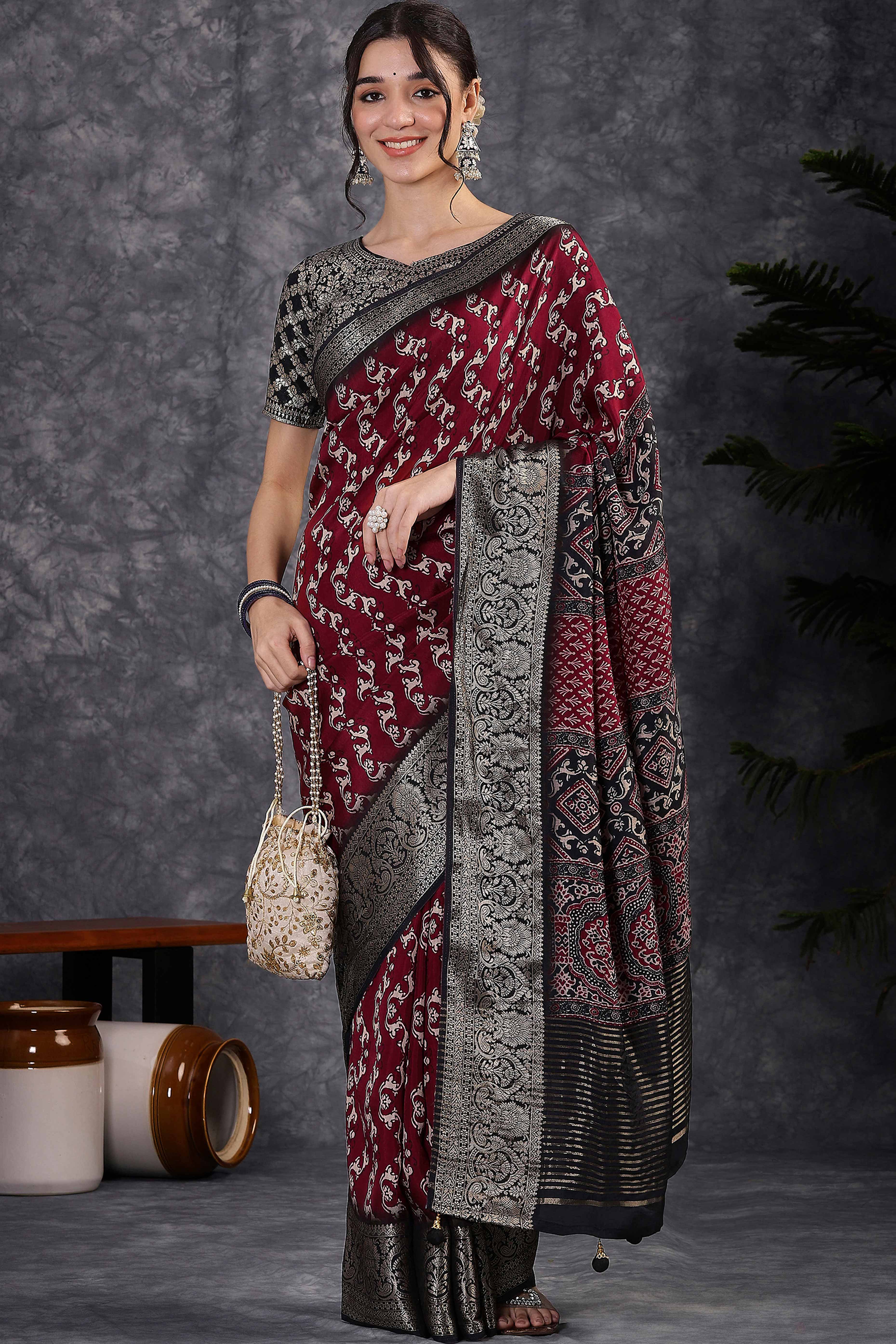 Maroon Dola Silk Saree Featuring Abstract Print & Jacquard Border