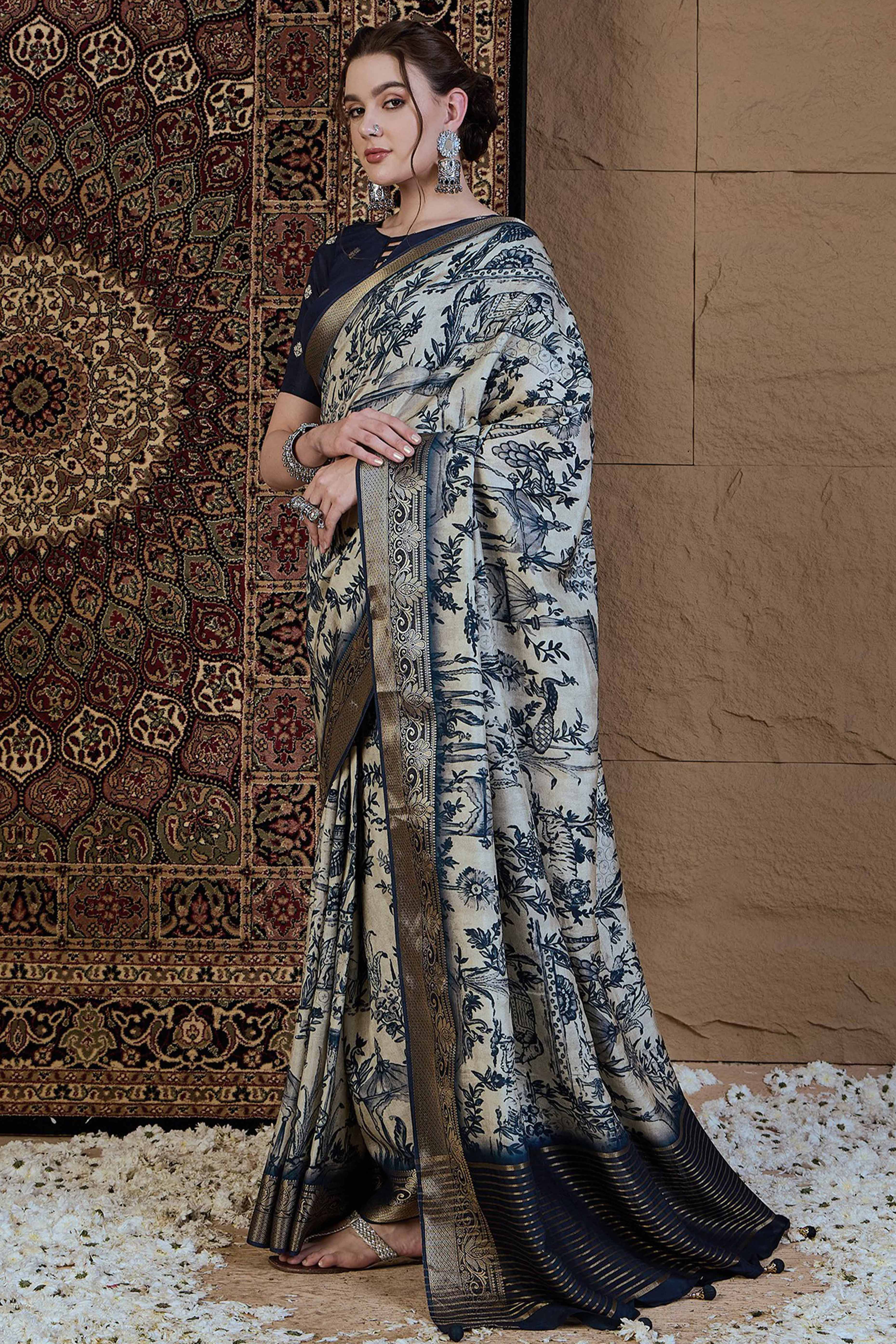 Off White Viscose Saree Featuring Delicate Floral Prints and a Rich Zari Border