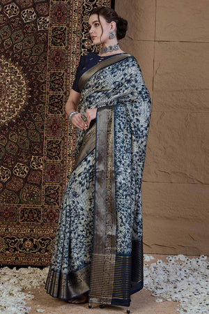 Floral Elegance in Off White Viscose Saree with Subtle Prints and Rich Zari Weave