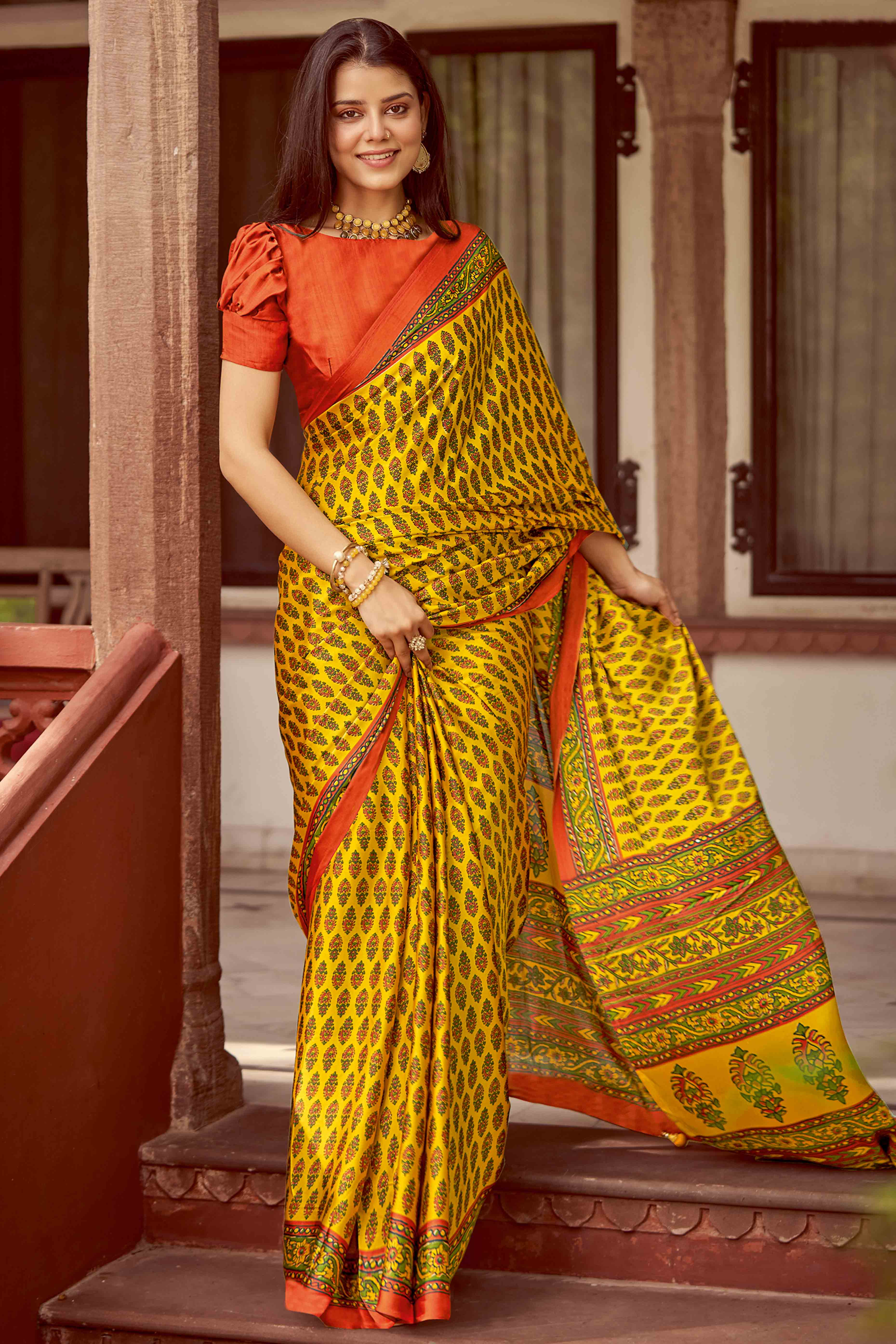 Yellow & Orange Floral Ajrakh Printed Satin Saree With Tassels