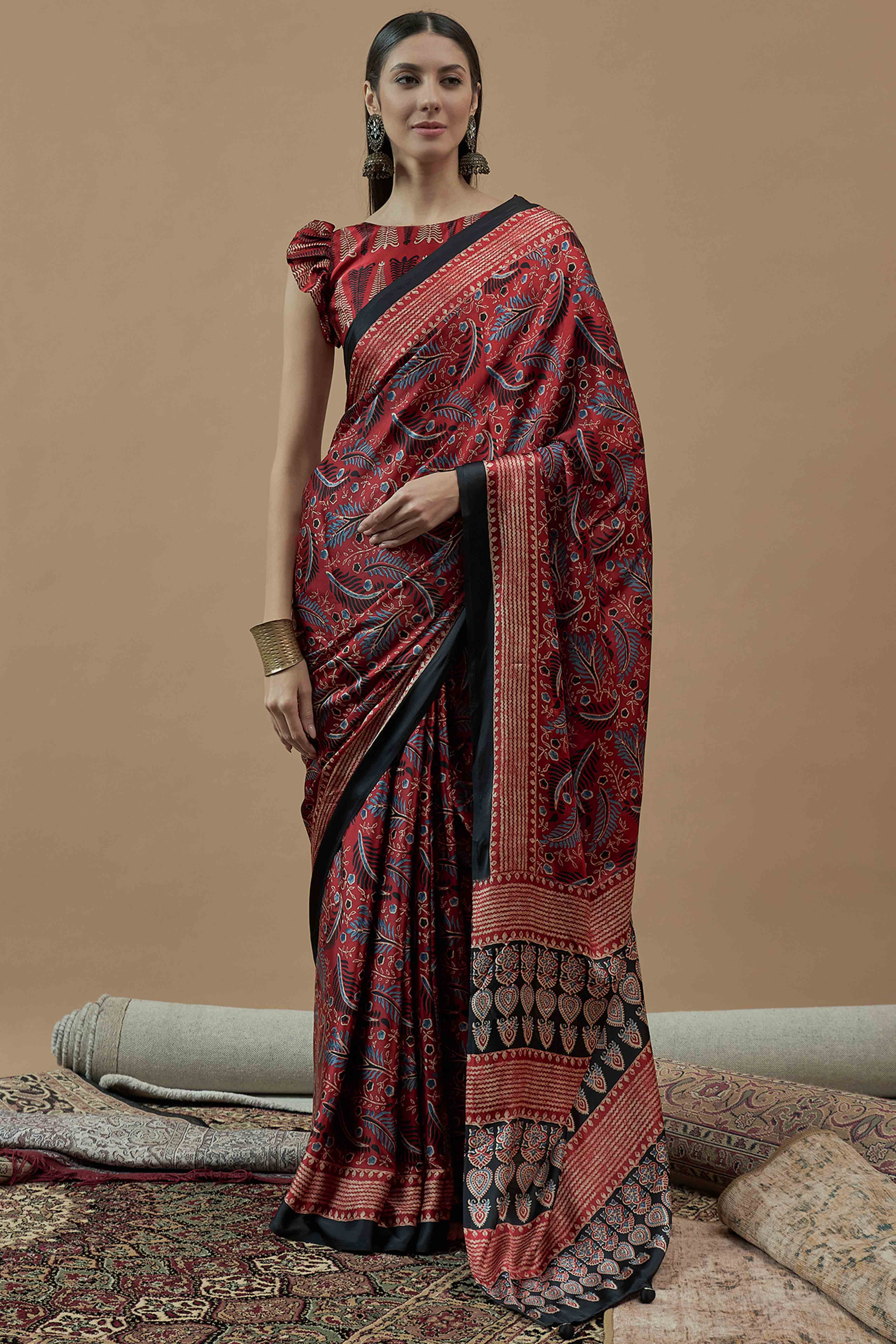 Red Ajrakh Printed Satin Saree With Tassels
