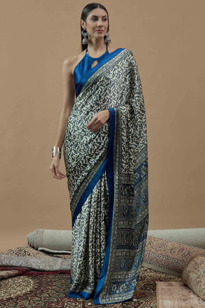 Offwhite & Blue Floral Ajrakh Printed Satin Saree With Tassels