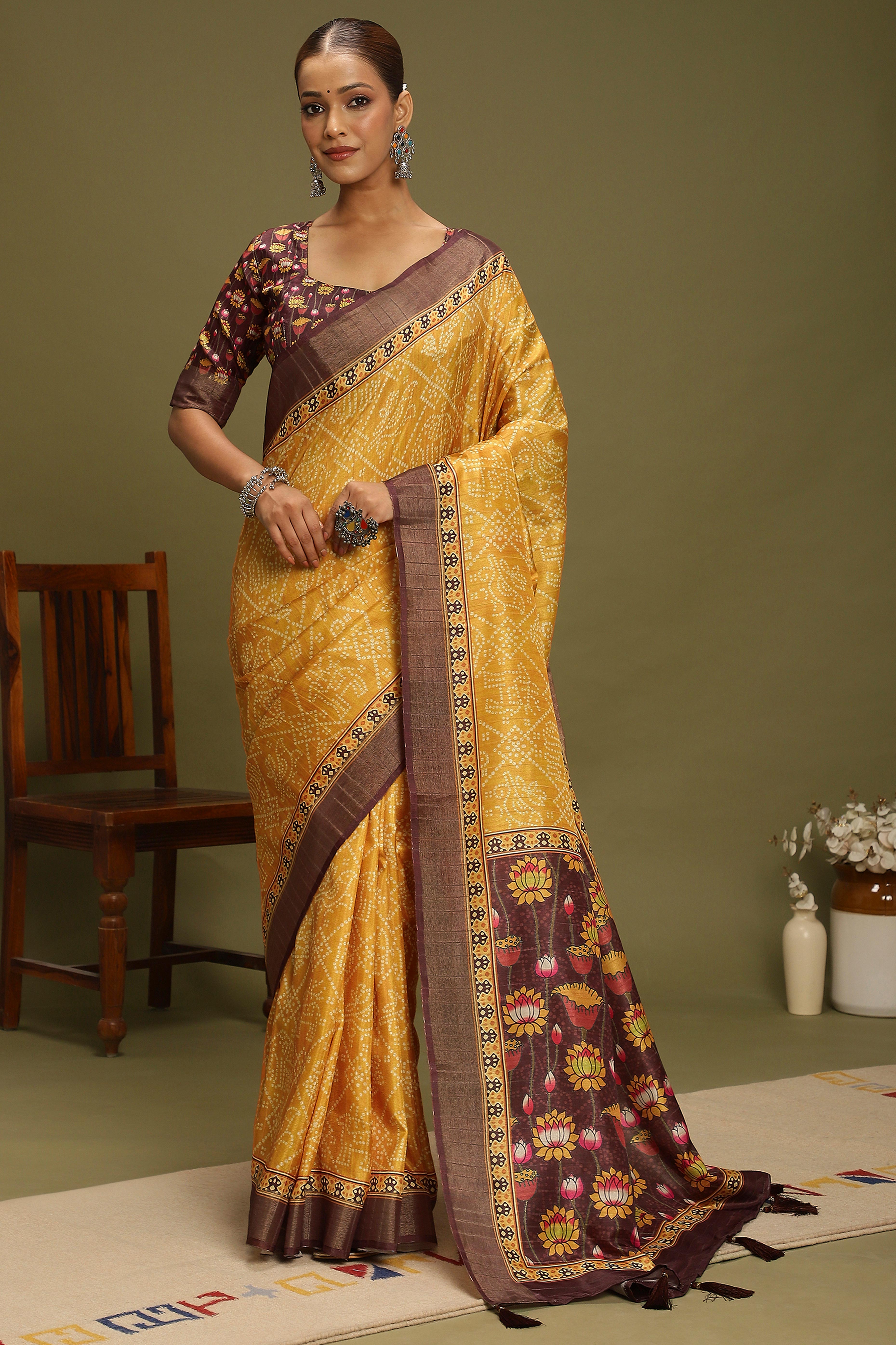 Yellow Silk Blend Saree Decorated with Vibrant Bandhani Prints and Festive Detailing