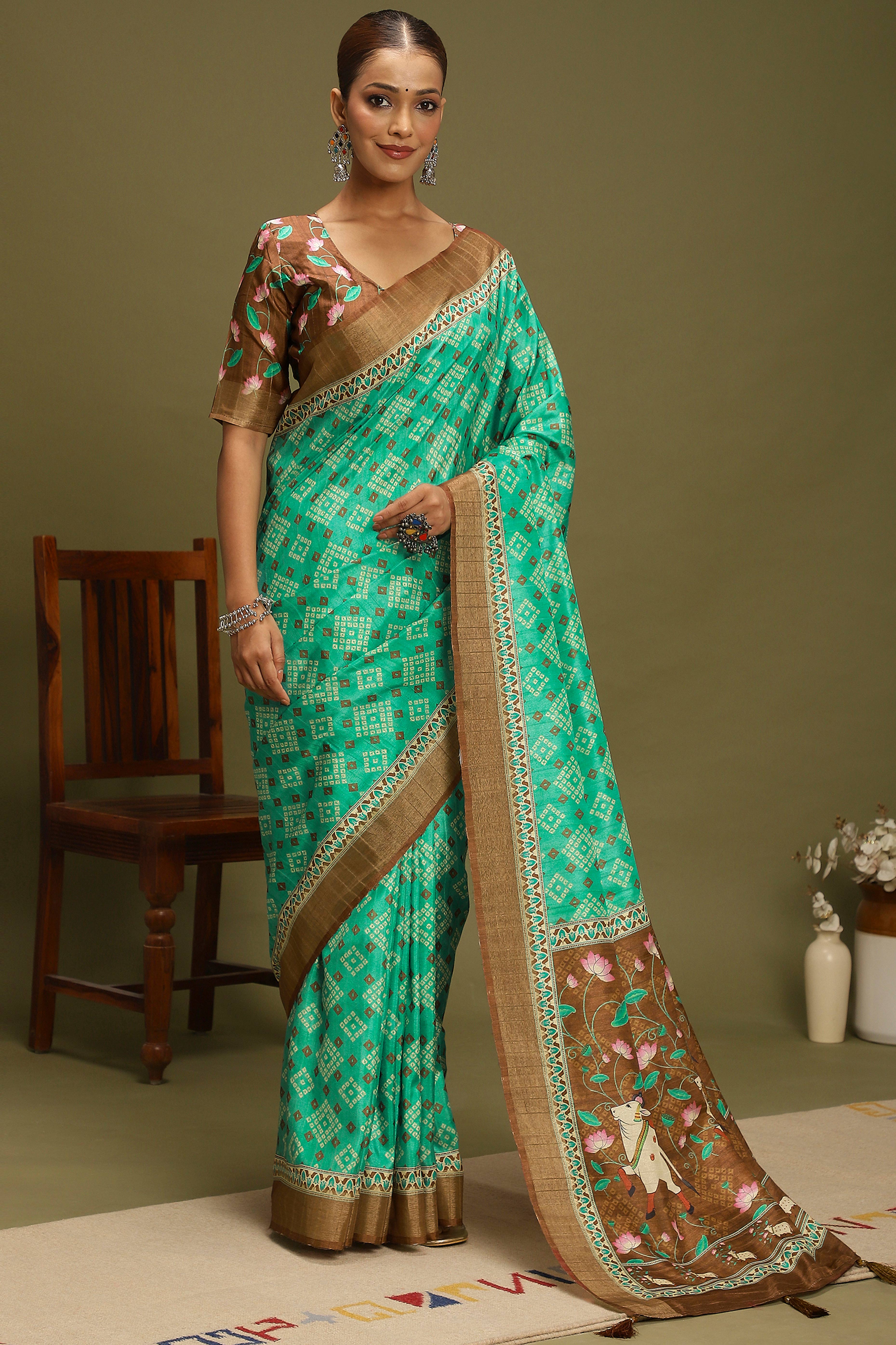 Rama Green Silk Blend Saree Decorated with Vibrant Bandhani Prints and Festive Detailing