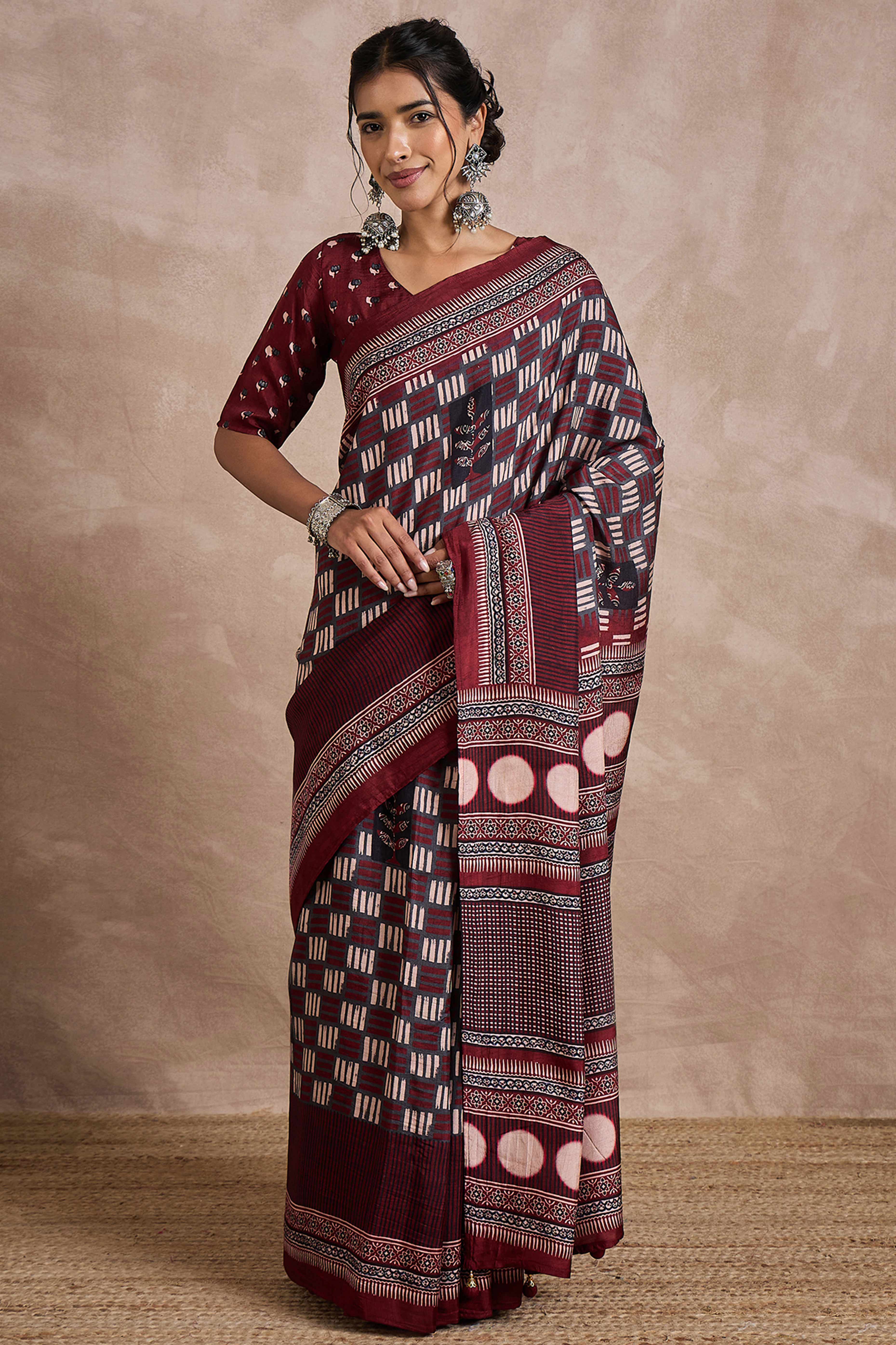 Maroon Dola Silk Saree Featuring Heritage Ajrakh Prints for Celebratory Occasions