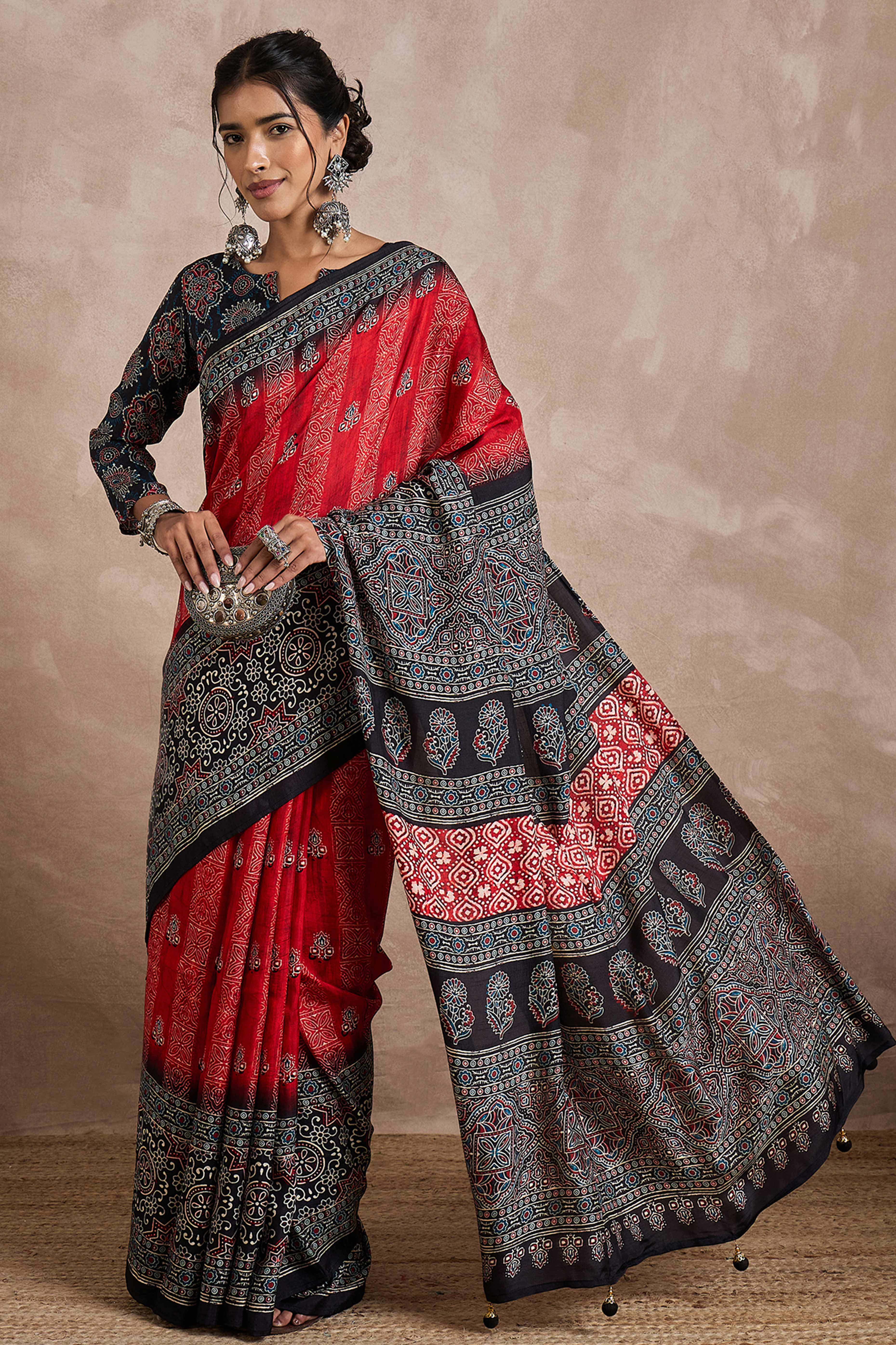 Red Dola Silk Saree Featuring Heritage Ajrakh Prints for Celebratory Occasions