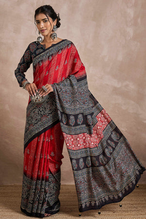 Red Dola Silk Saree Featuring Heritage Ajrakh Prints for Celebratory Occasions