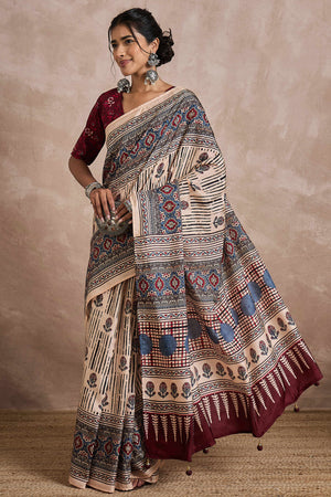 Cream Dola Silk Saree Featuring Heritage Ajrakh Prints for Celebratory Occasions