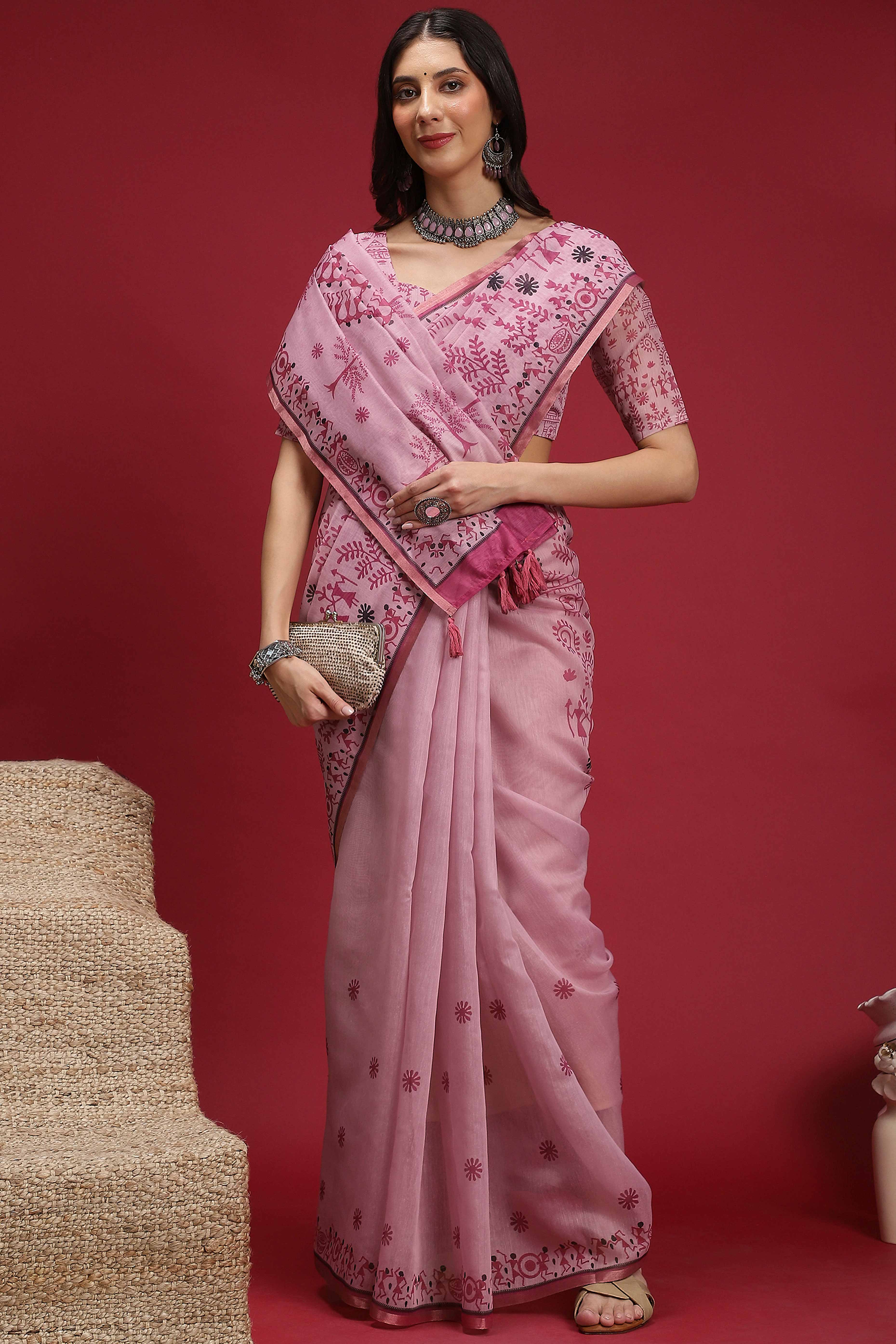 Pink Linen Cotton Saree Featuring Traditional Warli Prints & Tassel Pallu