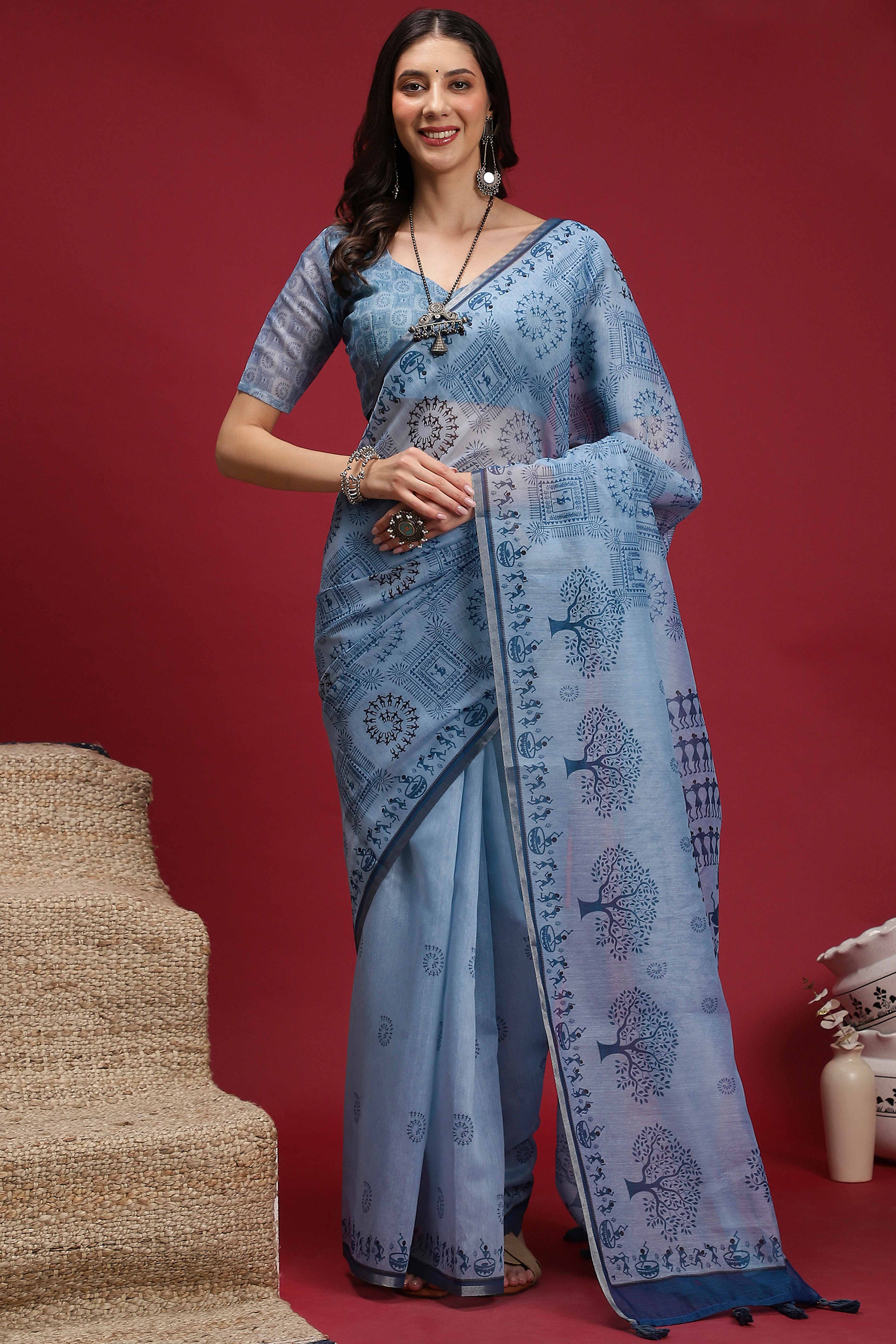 Powder Blue Linen Cotton Saree Featuring Traditional Warli Prints & Tassel Pallu