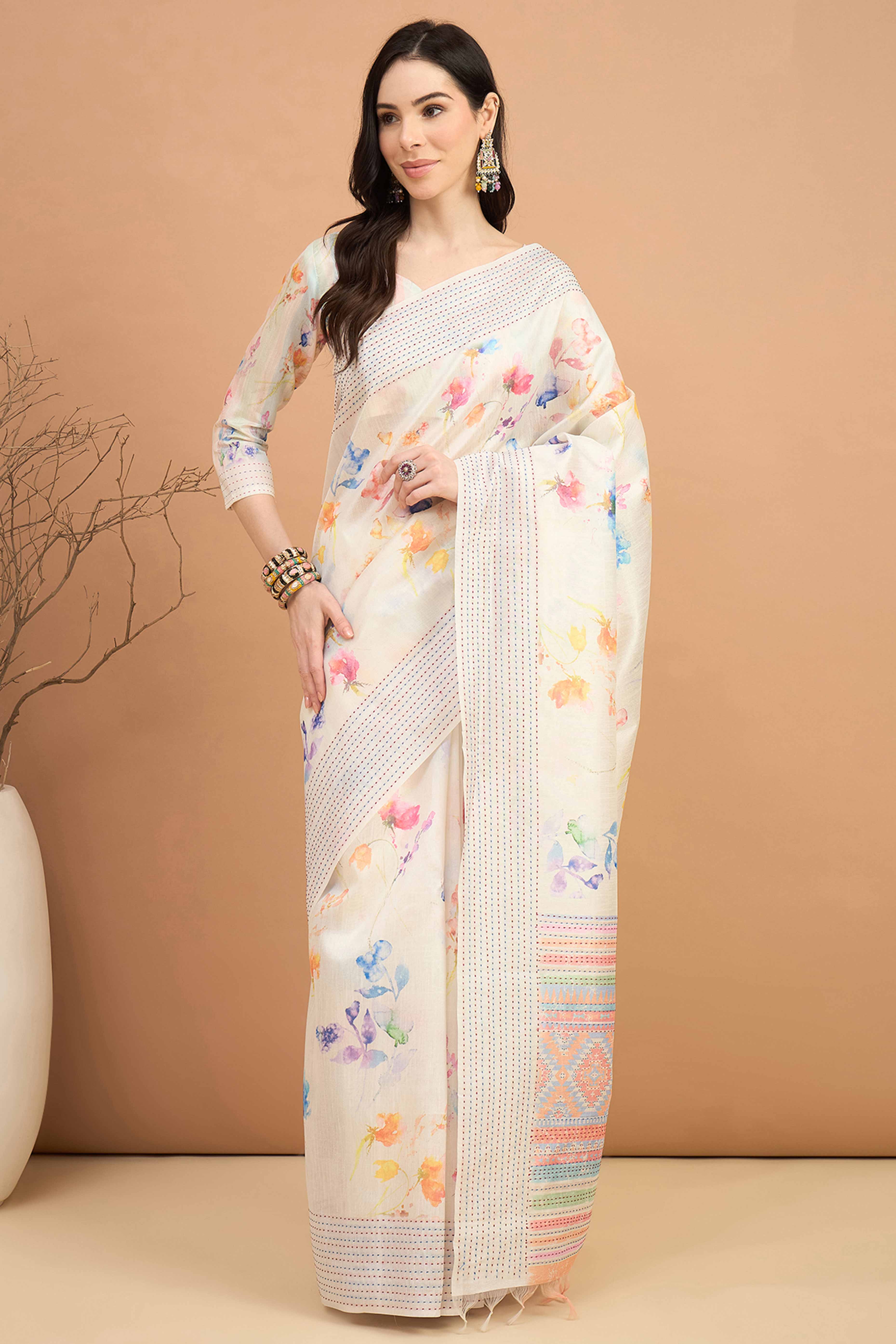 Offwhite Silk Blend Saree With Floral Prints & Delicate Tassels Border