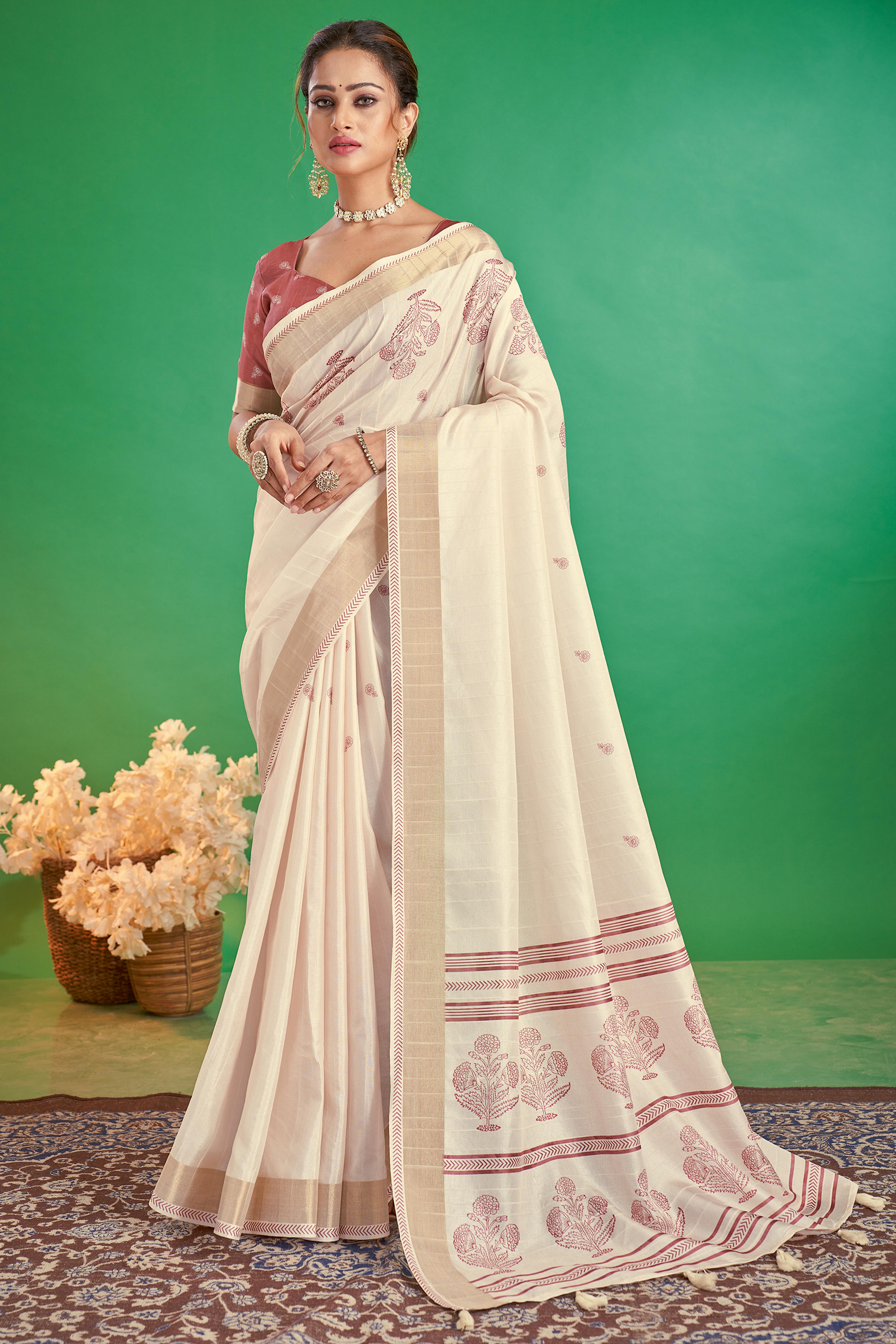 Charming Offwhite & Rose Pink Floral Printed Kotha Cotton Silk Saree Adorned With Tassel Pallu