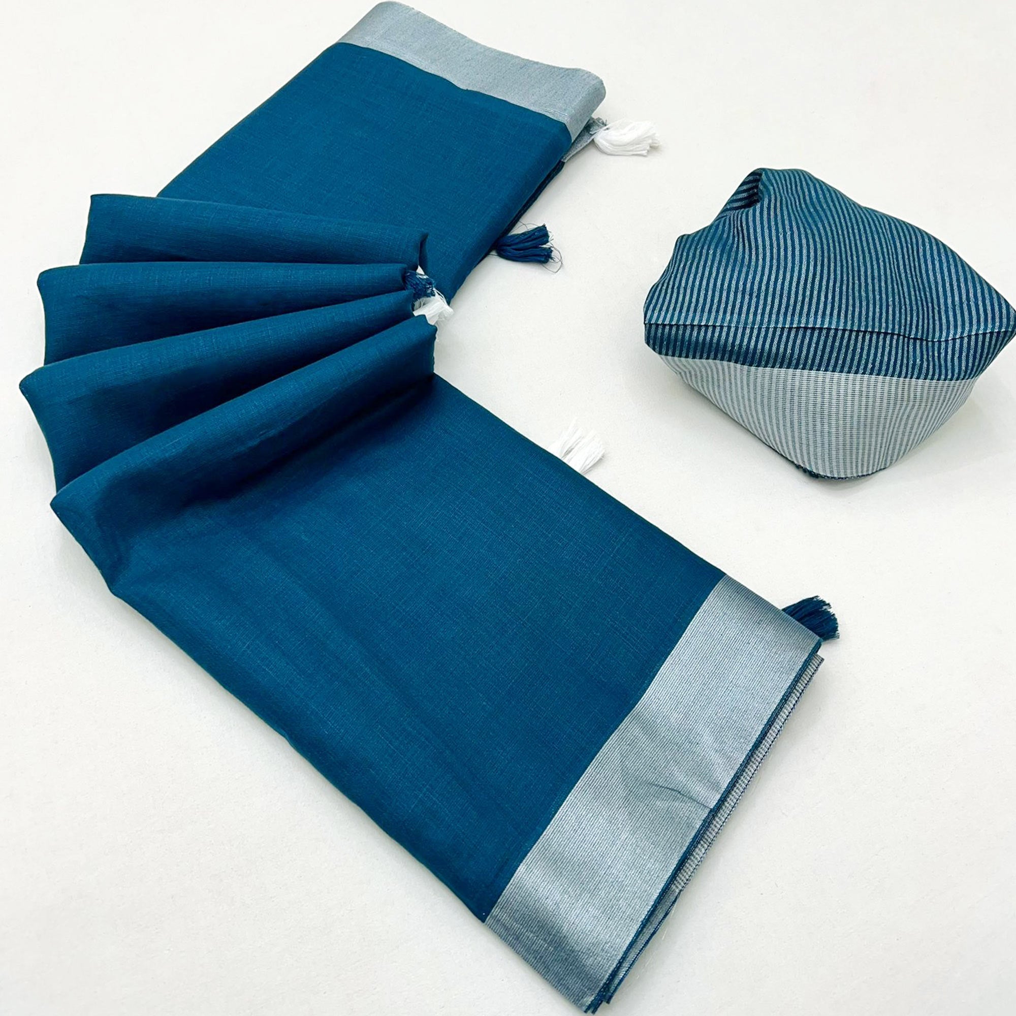 Blue Solid Pure Linen Saree With Zari Woven Border