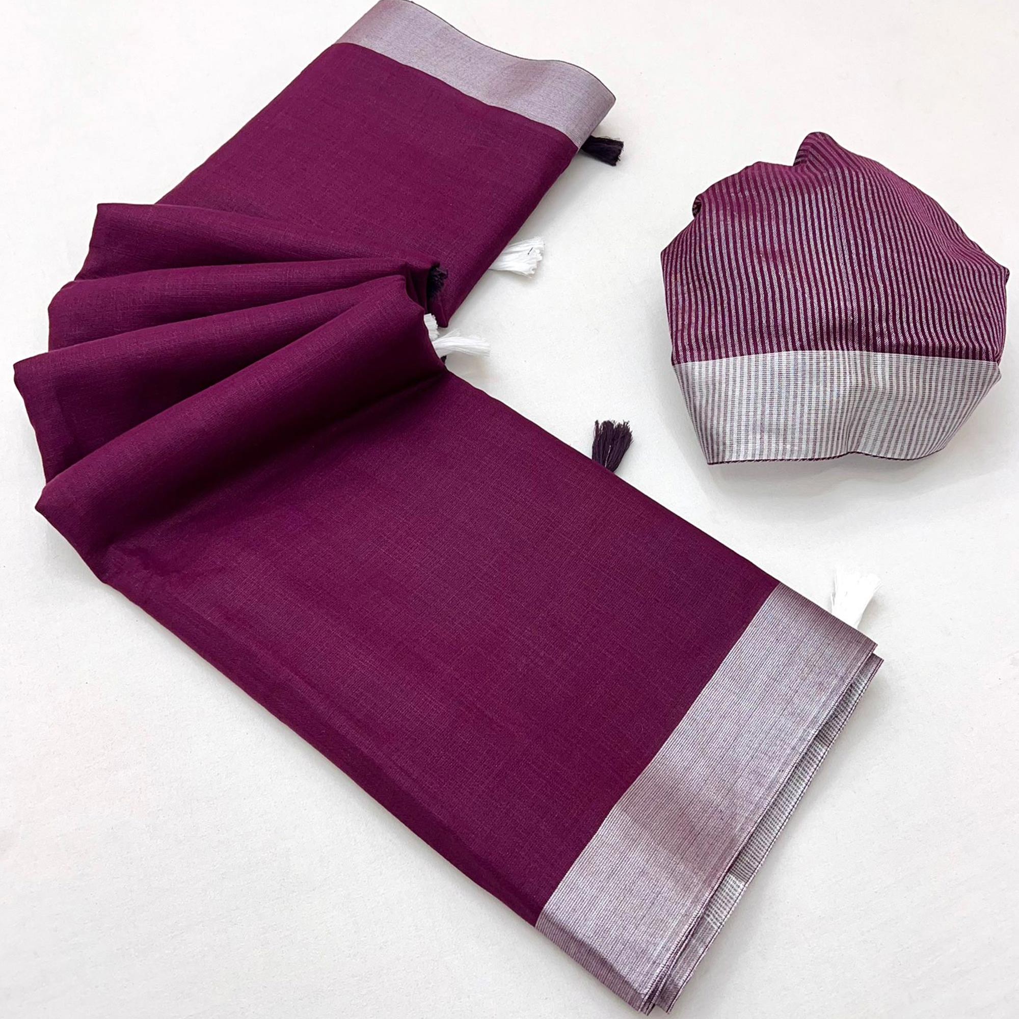 Wine Solid Pure Linen Saree With Zari Woven Border