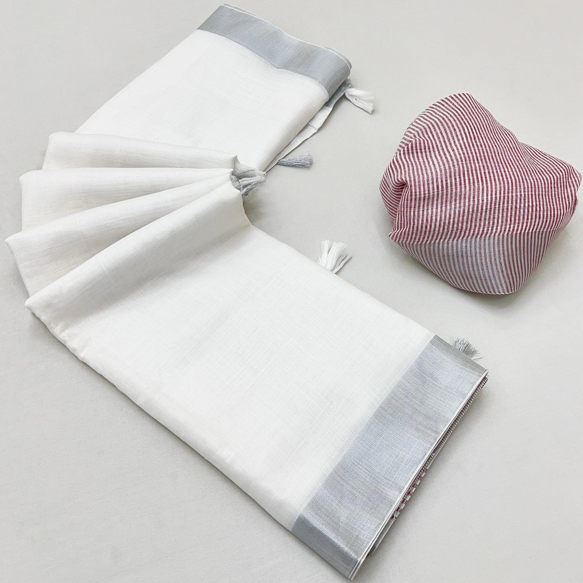 White & Wine Zari Woven Linen Saree With Tassels