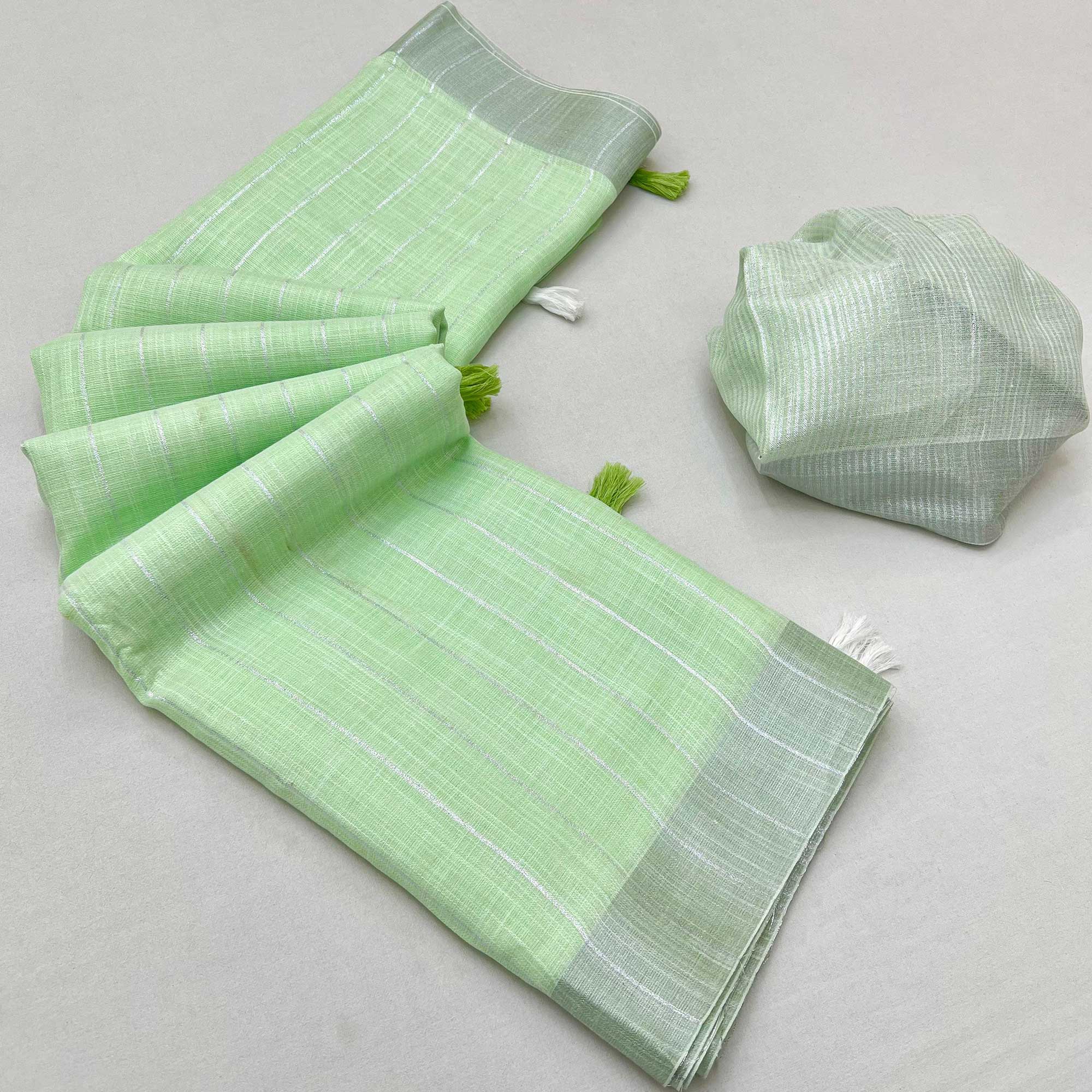 Green Zari Woven Linen Saree With Tassels