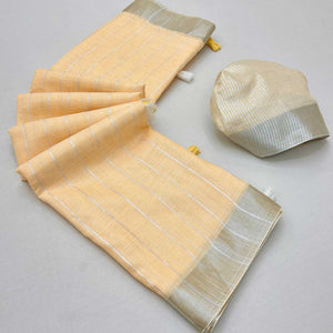 Light Orange Zari Woven Linen Saree With Tassels