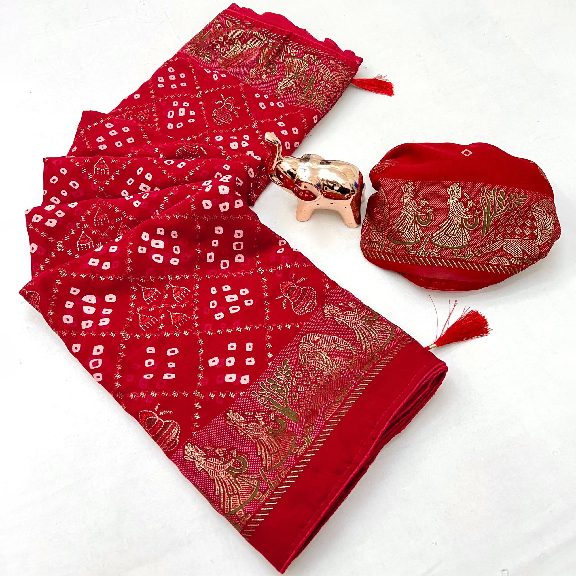 Elegant Red Bandhani Foil Printed Georgette Saree Highlighted With Soft Tassel Pallu