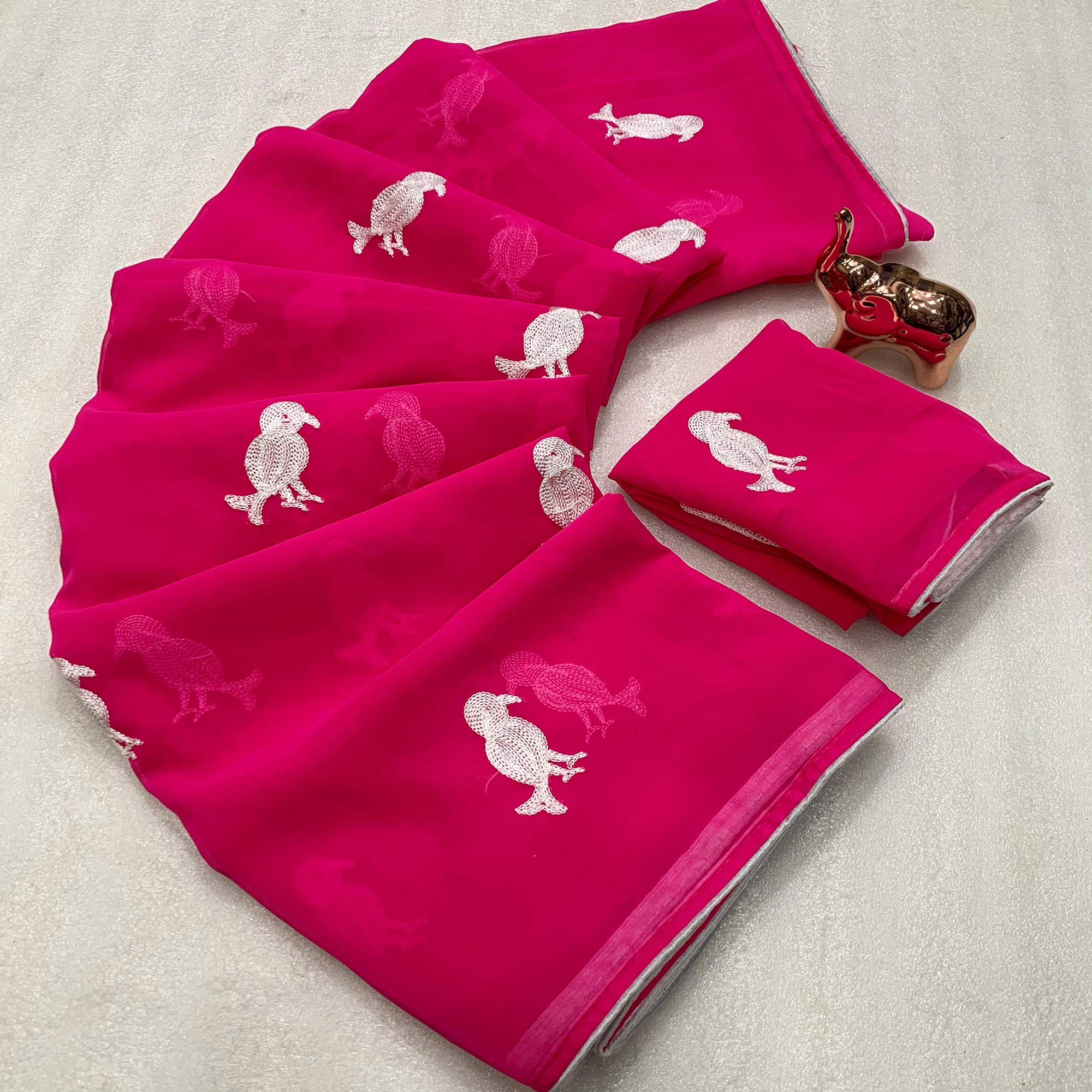 Pink Georgette Saree Adorned With Elegant Bird Embroidery