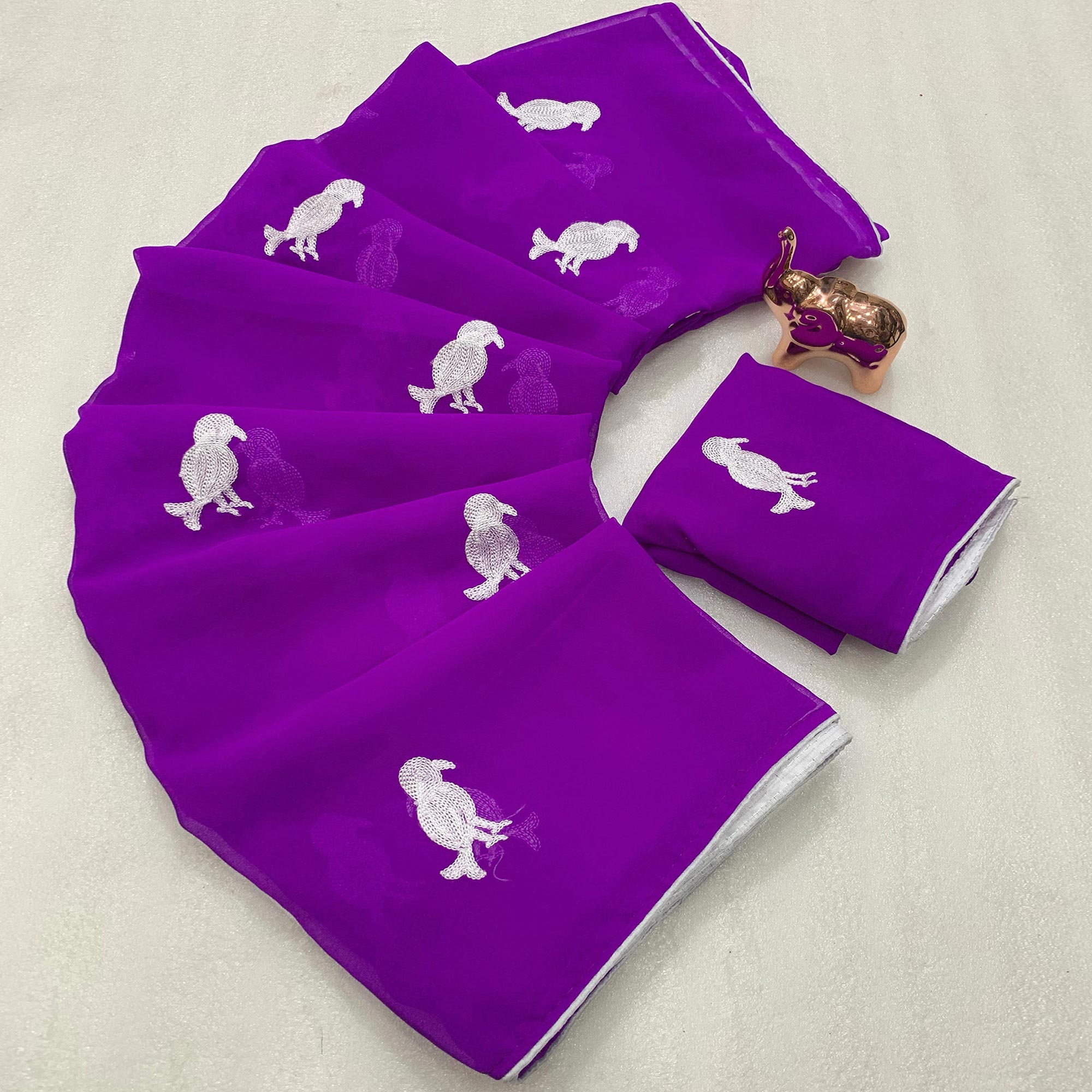 Purple Georgette Saree Adorned With Elegant Bird Embroidery