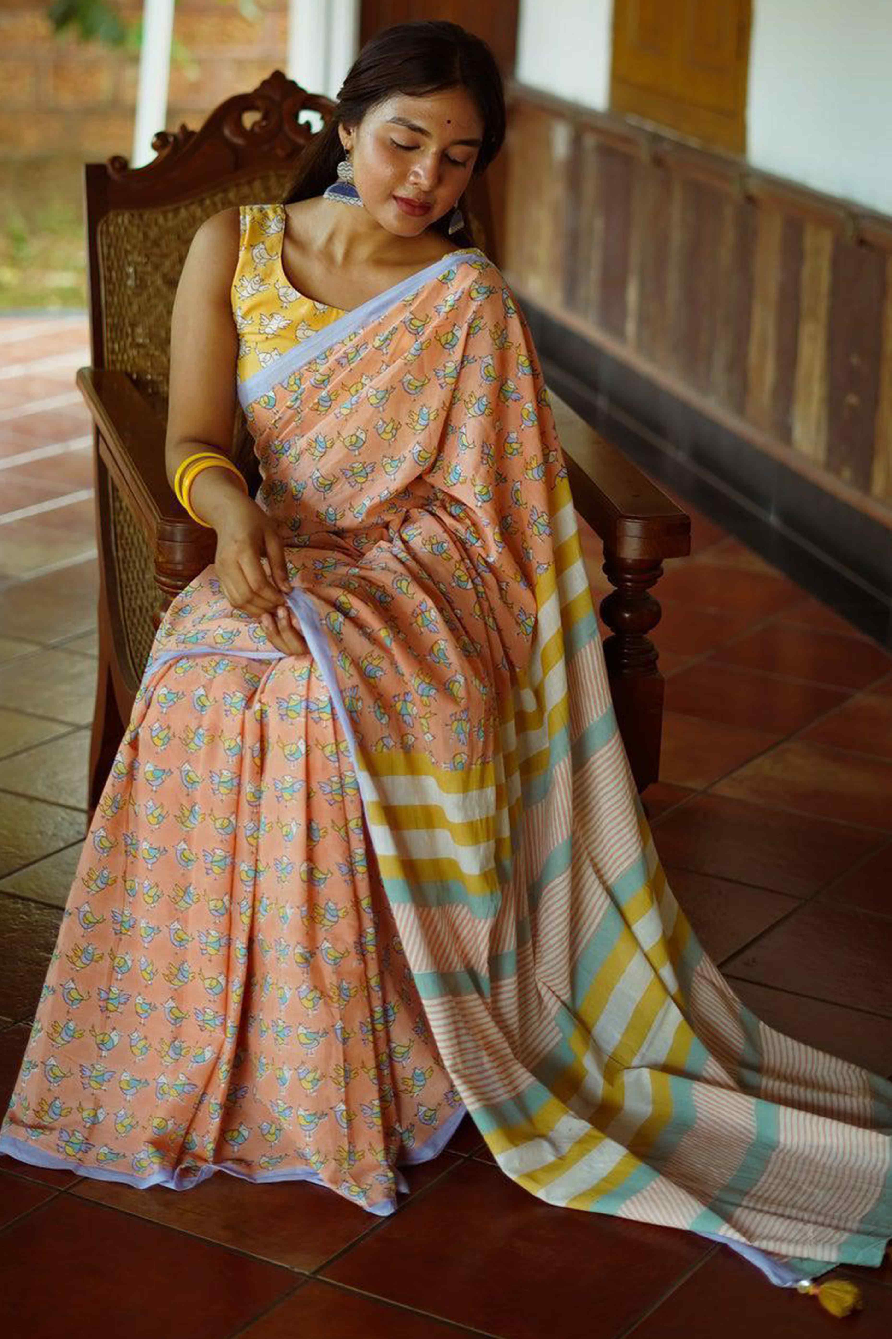 Light Orange Batik Printed Pure Linen Saree With Tassels