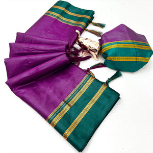Classic Purple Solid Weaving Pure Silk Saree Accented With Woven Striped Pallu & Tassel Finish
